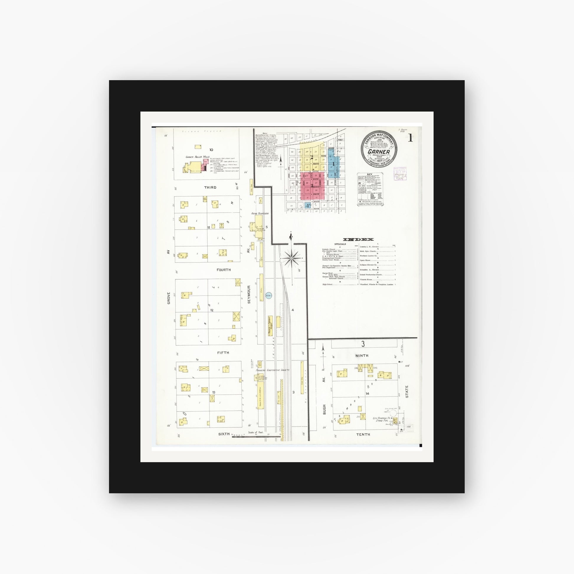 Old map wall art mockup — black gallery frame with white mat — Sanborn Fire Insurance Map from Garner, Hancock County, Iowa (1907) â€” Complete Set