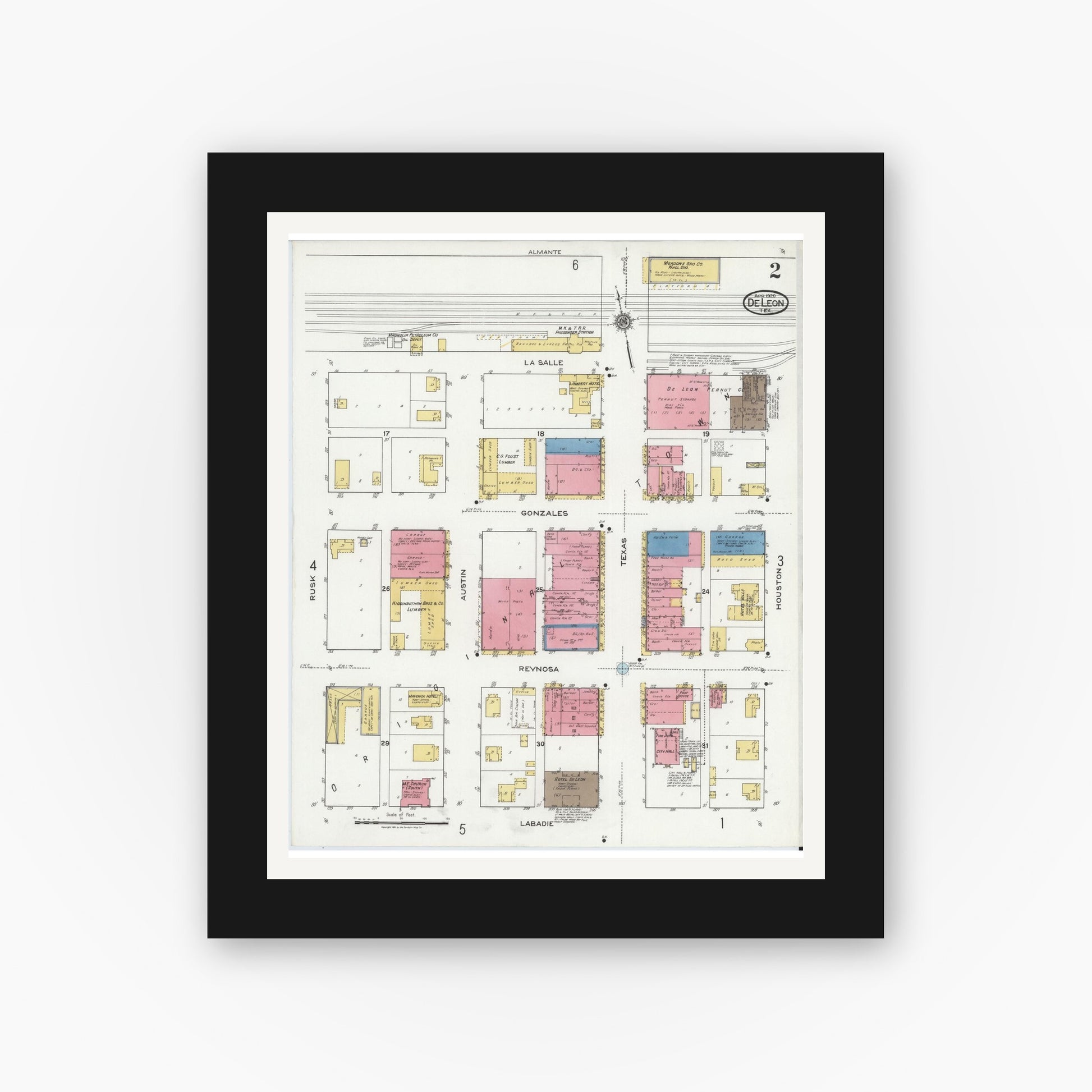 Old map wall art mockup — black gallery frame with white mat — Sanborn Fire Insurance Map from De Leon, Comanche County, Texas (1920), Sheet #0002