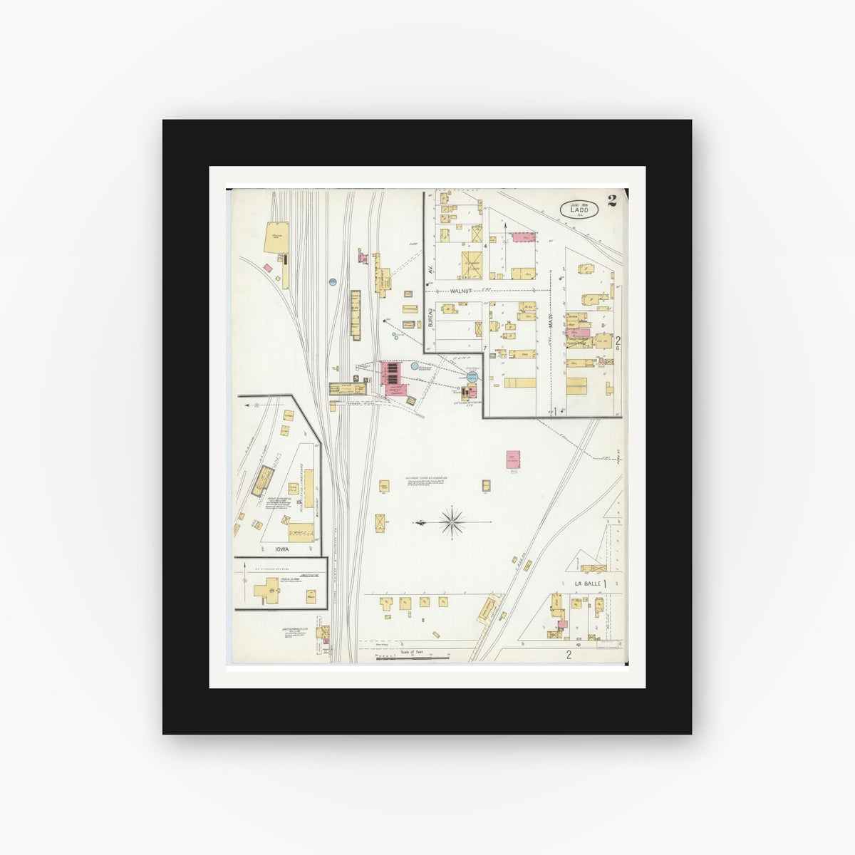 Old map wall art mockup — black gallery frame with white mat — Sanborn Fire Insurance Map from Ladd, Bureau County, Illinois (1906), Sheet #0002
