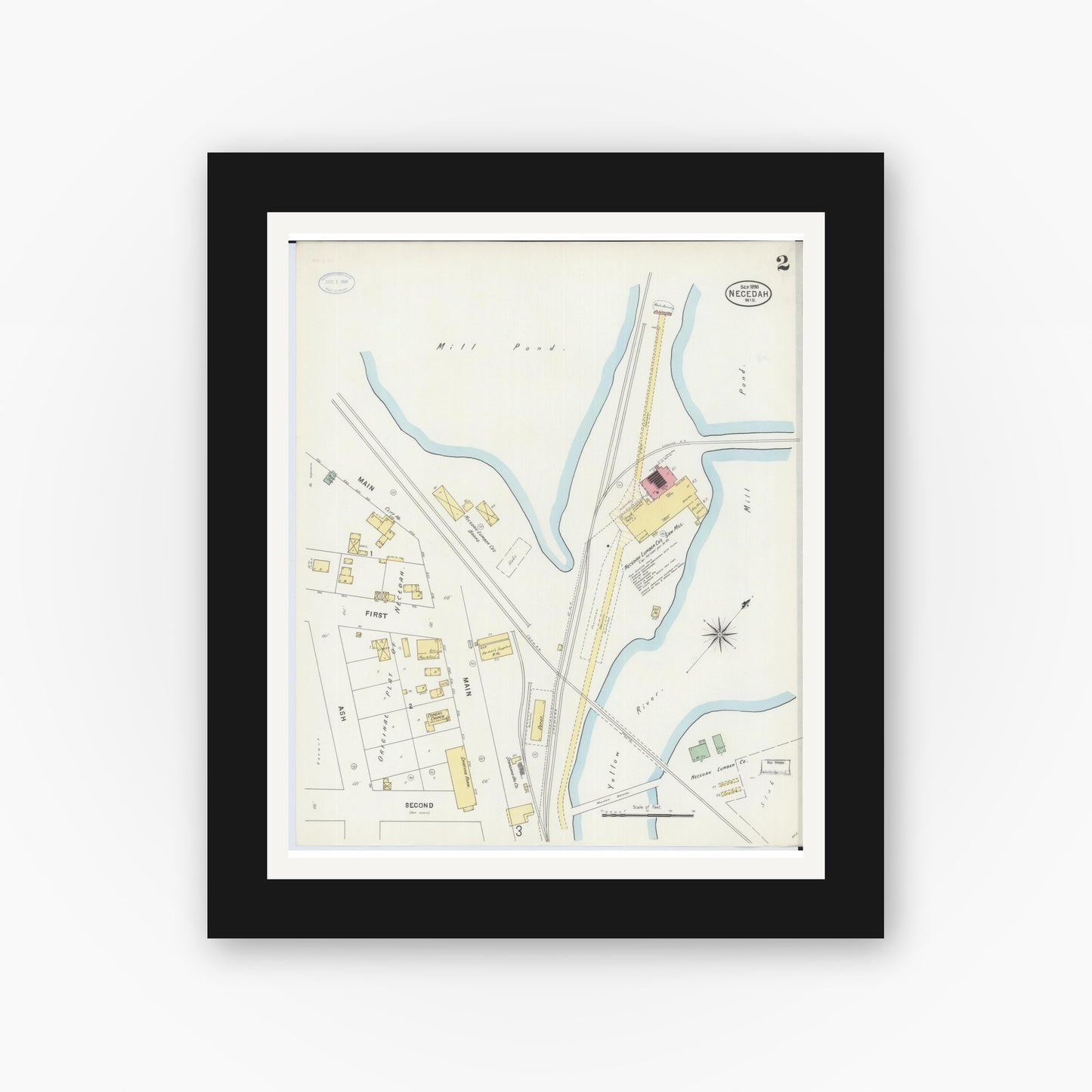 Old map wall art mockup — black gallery frame with white mat — Sanborn Fire Insurance Map from Necedah, Juneau County, Wisconsin (1898), Sheet #0002