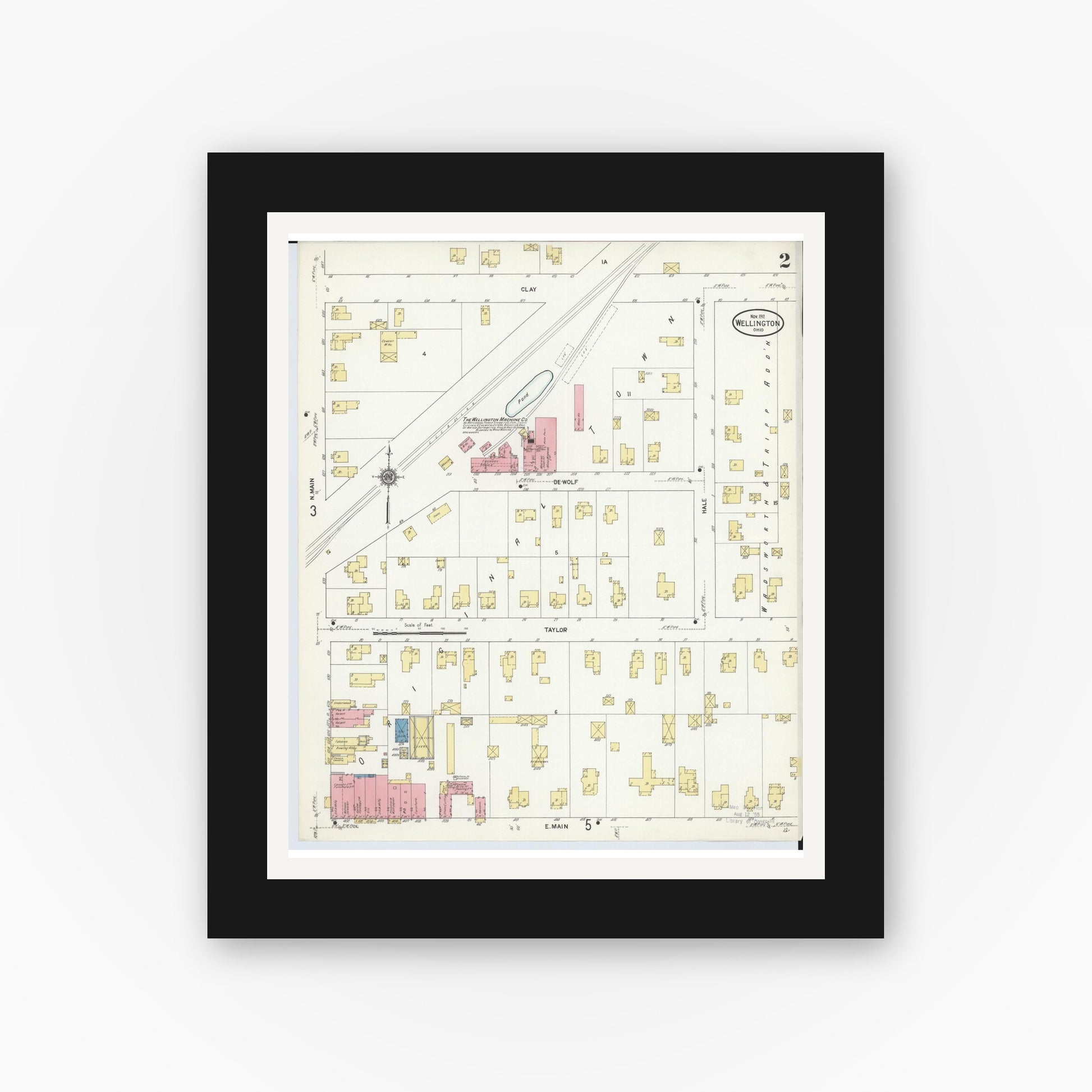 Old map wall art mockup — black gallery frame with white mat — Sanborn Fire Insurance Map from Wellington, Lorain County, Ohio (1911), Sheet #0002