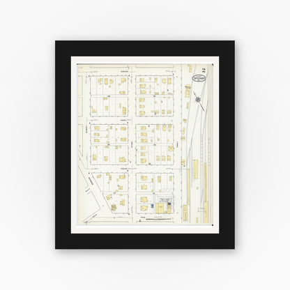 Old map wall art mockup — black gallery frame with white mat — Sanborn Fire Insurance Map from Spooner, Washburn County, Wisconsin (1917), Sheet #0002