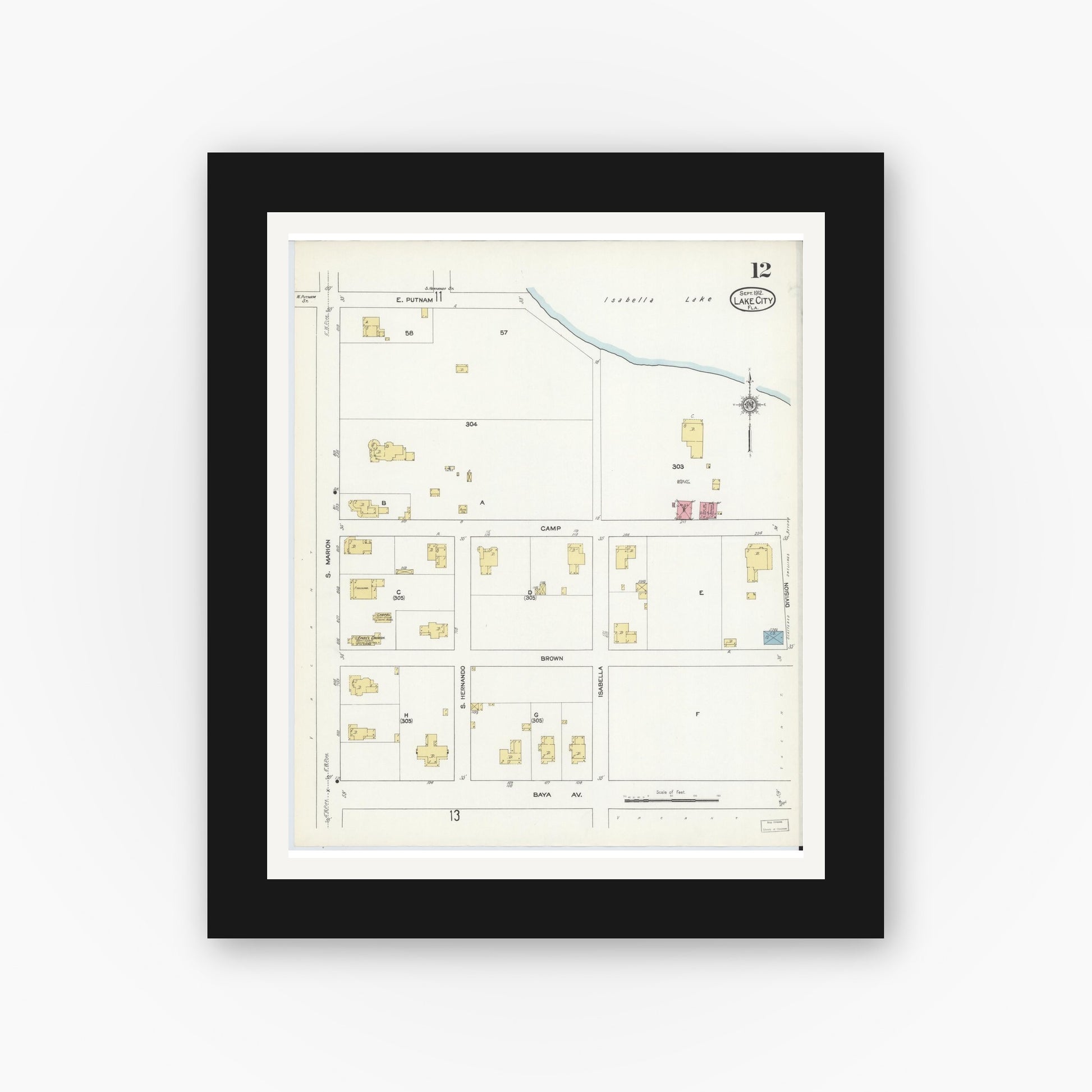 Old map wall art mockup — black gallery frame with white mat — Sanborn Fire Insurance Map from Lake City, Columbia County, Florida (1912), Sheet #0012