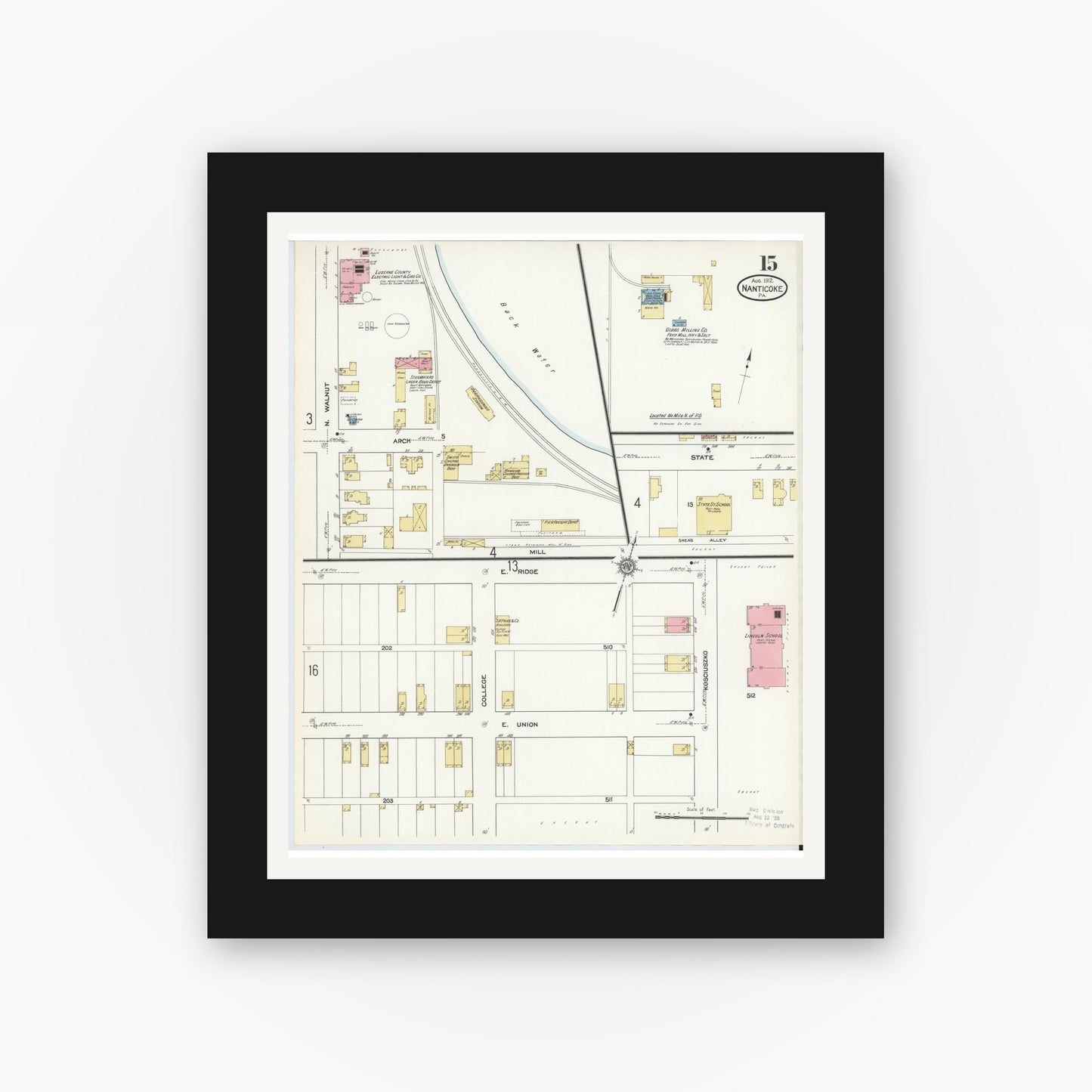 Old map wall art mockup — black gallery frame with white mat — Sanborn Fire Insurance Map from Nanticoke, Luzerne County, Pennsylvania (1912), Sheet #0015