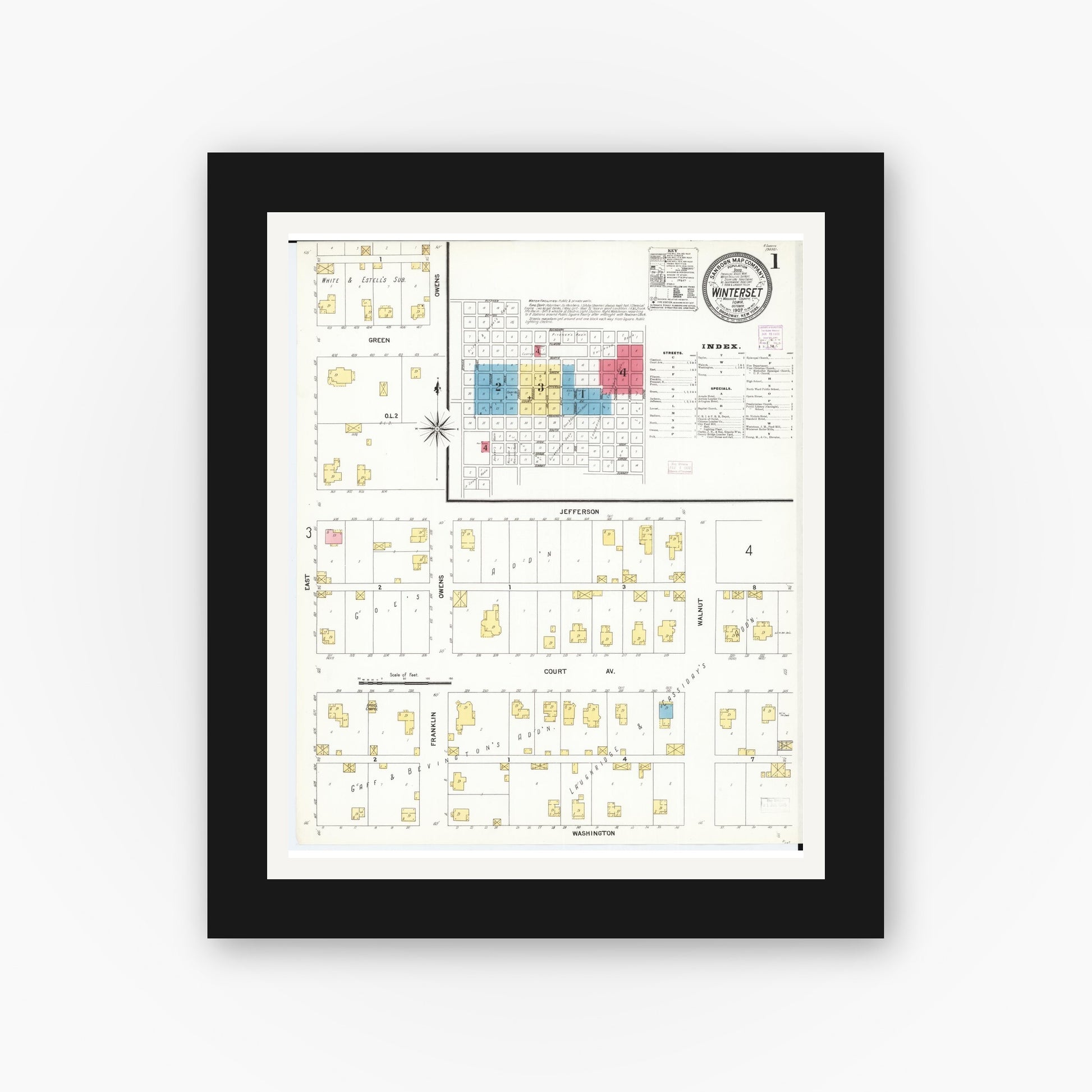 Old map wall art mockup — black gallery frame with white mat — Sanborn Fire Insurance Map from Winterset, Madison County, Iowa (1907), Sheet #0001