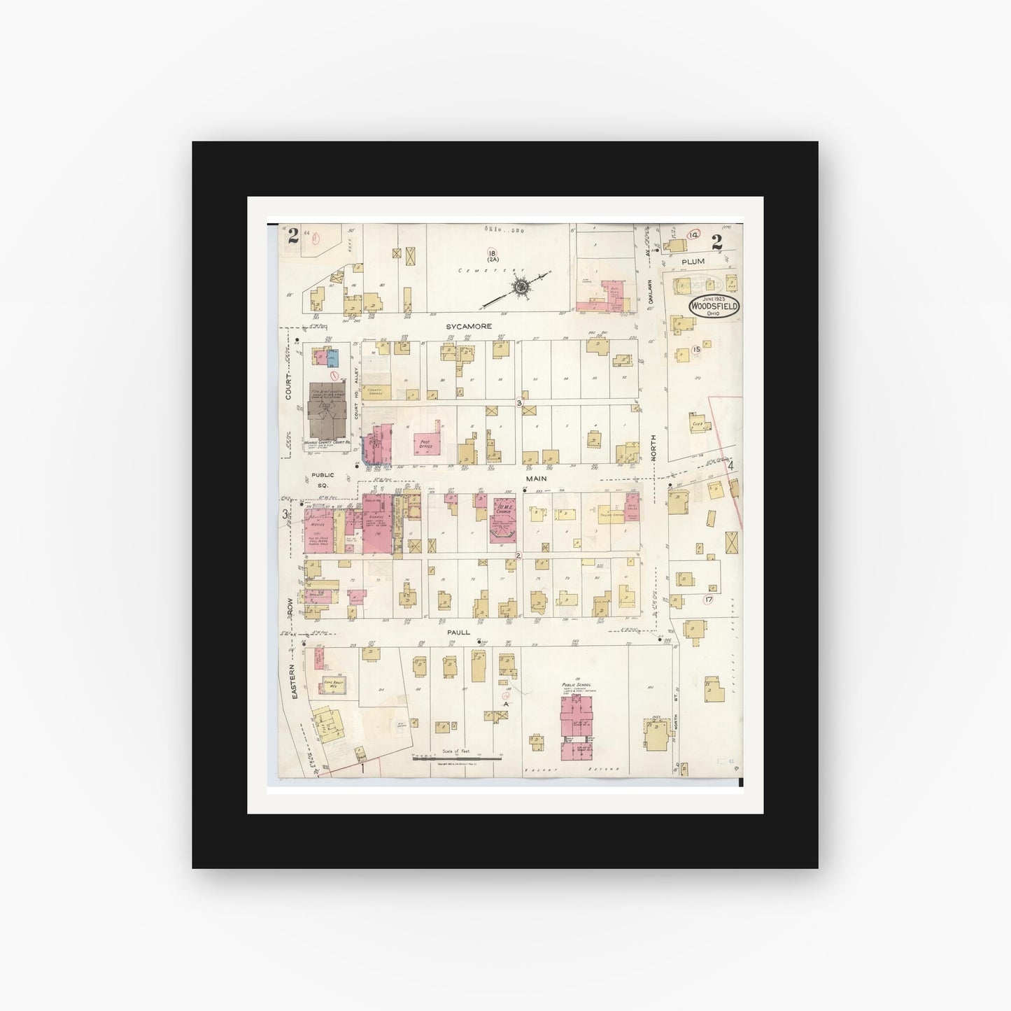 Old map wall art mockup — black gallery frame with white mat — Sanborn Fire Insurance Map from Woodsfield, Monroe County, Ohio (1949), Sheet #0002