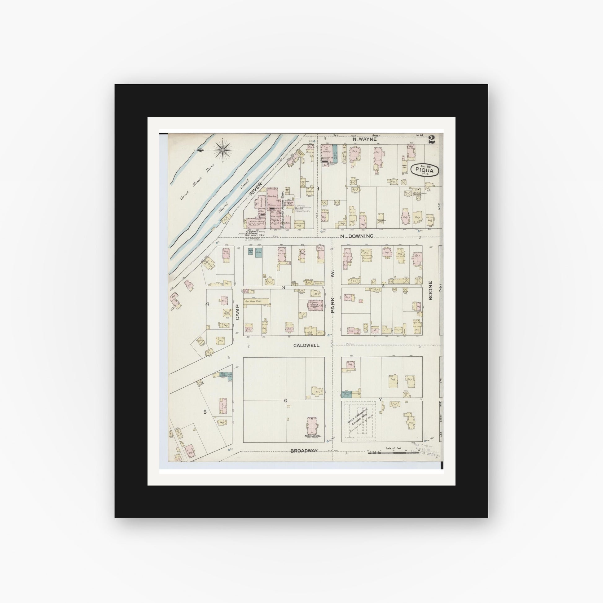 Old map wall art mockup — black gallery frame with white mat — Sanborn Fire Insurance Map from Piqua, Miami County, Ohio (1887), Sheet #0002