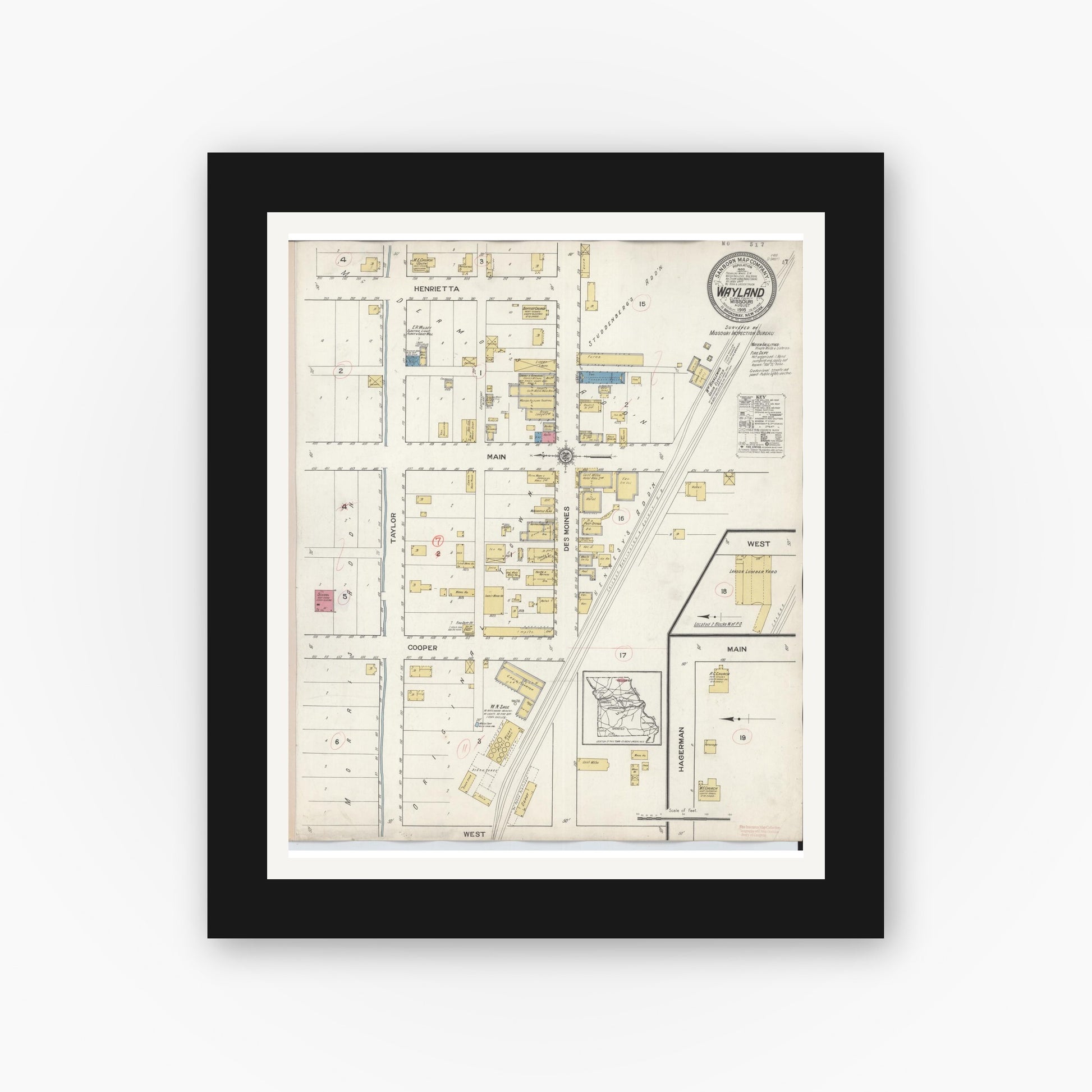 Old map wall art mockup — black gallery frame with white mat — Sanborn Fire Insurance Map from Wayland, Clark County, Missouri (1916), Sheet #0001