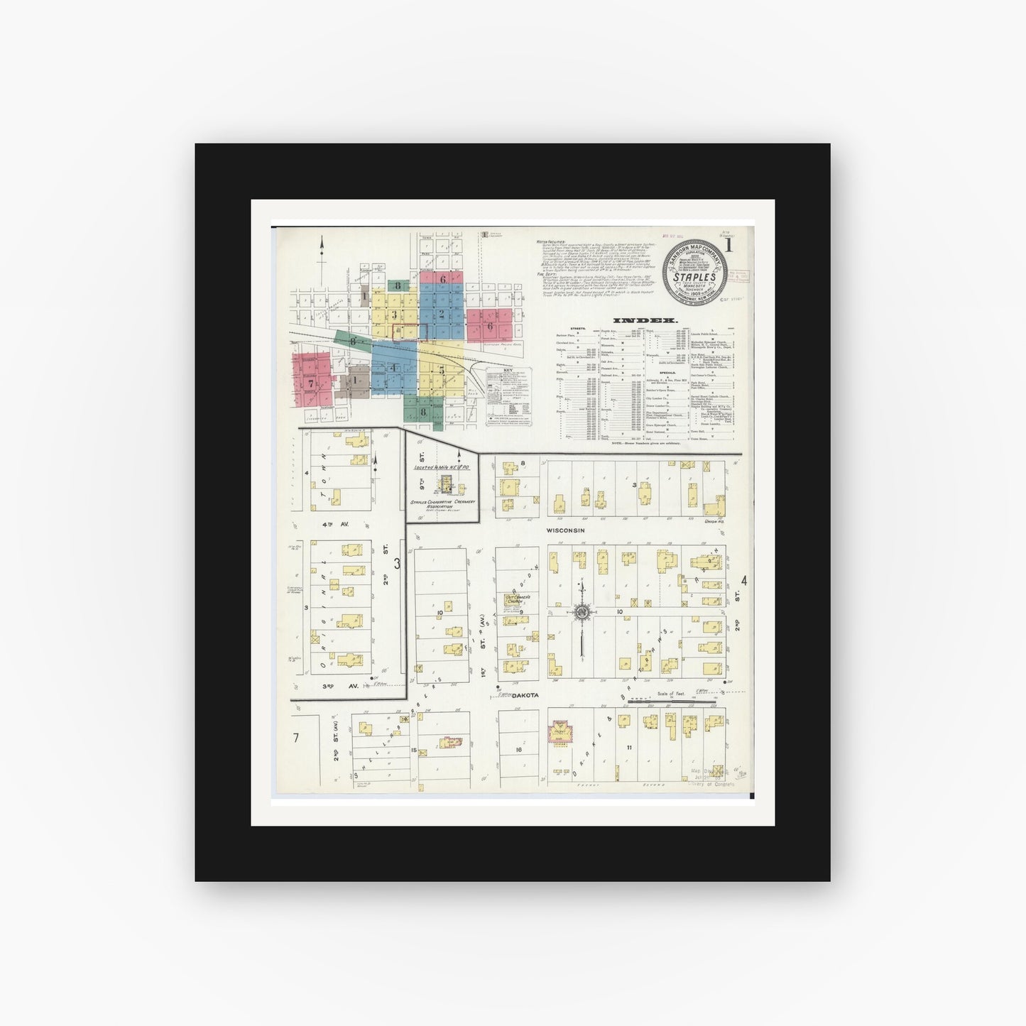 Old map wall art mockup — black gallery frame with white mat — Sanborn Fire Insurance Map from Staples, Todd County, Minnesota (1909) - Complete Map Set