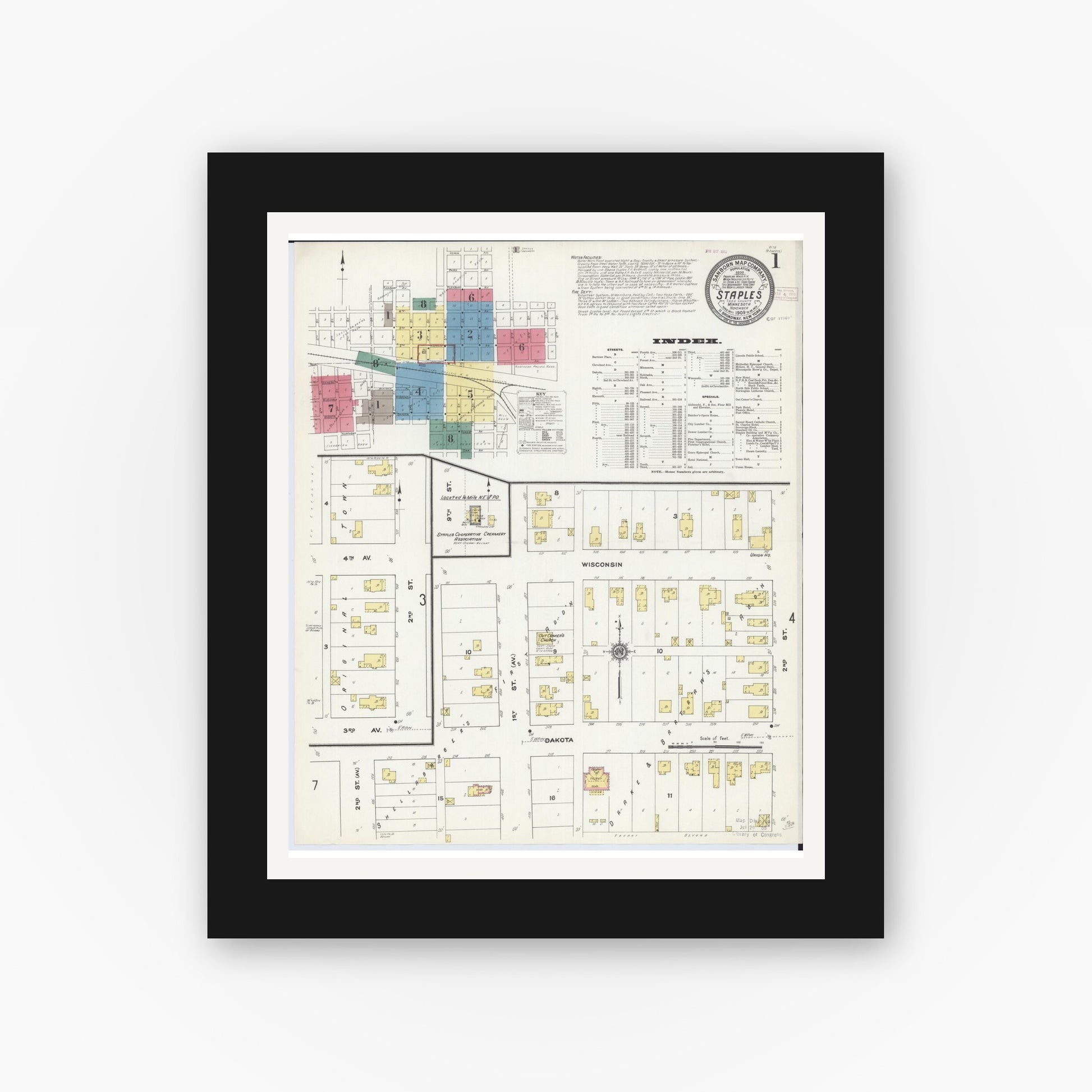 Old map wall art mockup — black gallery frame with white mat — Sanborn Fire Insurance Map from Staples, Todd County, Minnesota (1909) - Complete Map Set