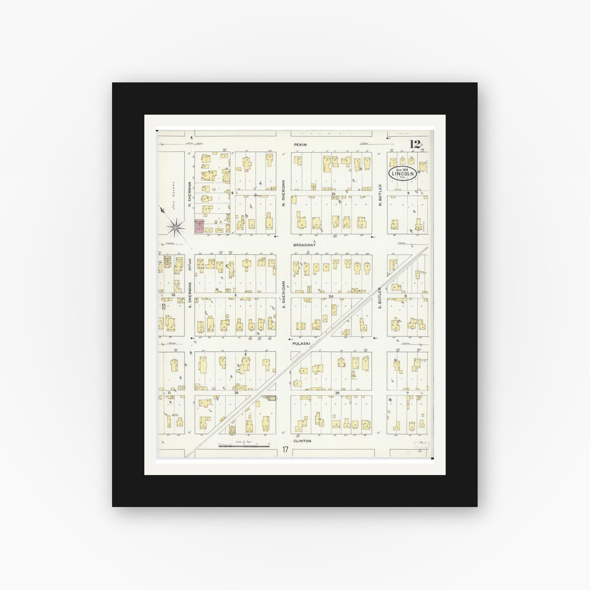 Old map wall art mockup — black gallery frame with white mat — Sanborn Fire Insurance Map from Lincoln, Logan County, Illinois (1909), Sheet #0012