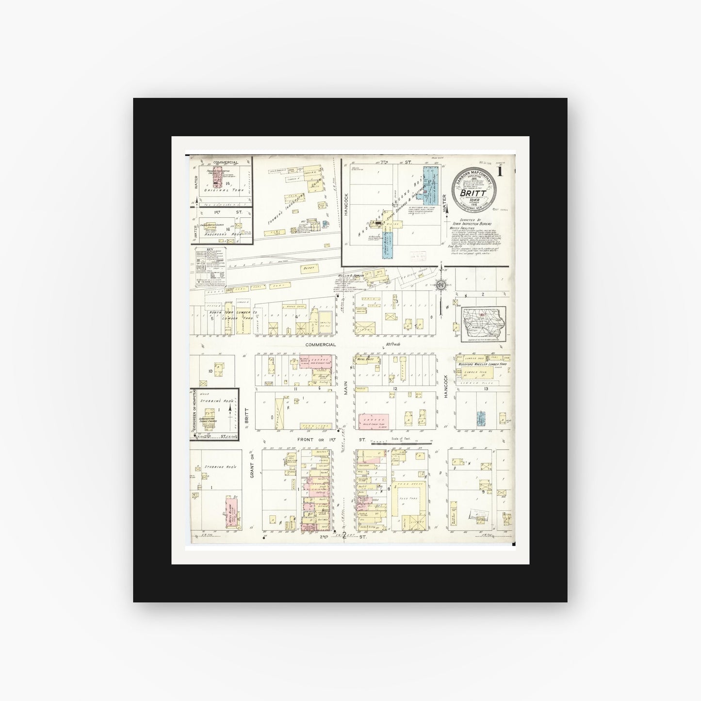 Old map wall art mockup — black gallery frame with white mat — Sanborn Fire Insurance Map from Britt, Hancock County, Iowa (1914) â€” Complete Set