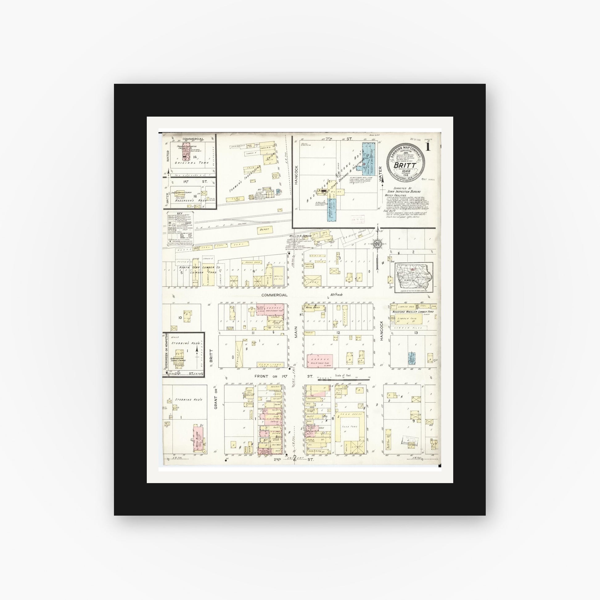 Old map wall art mockup — black gallery frame with white mat — Sanborn Fire Insurance Map from Britt, Hancock County, Iowa (1914) â€” Complete Set