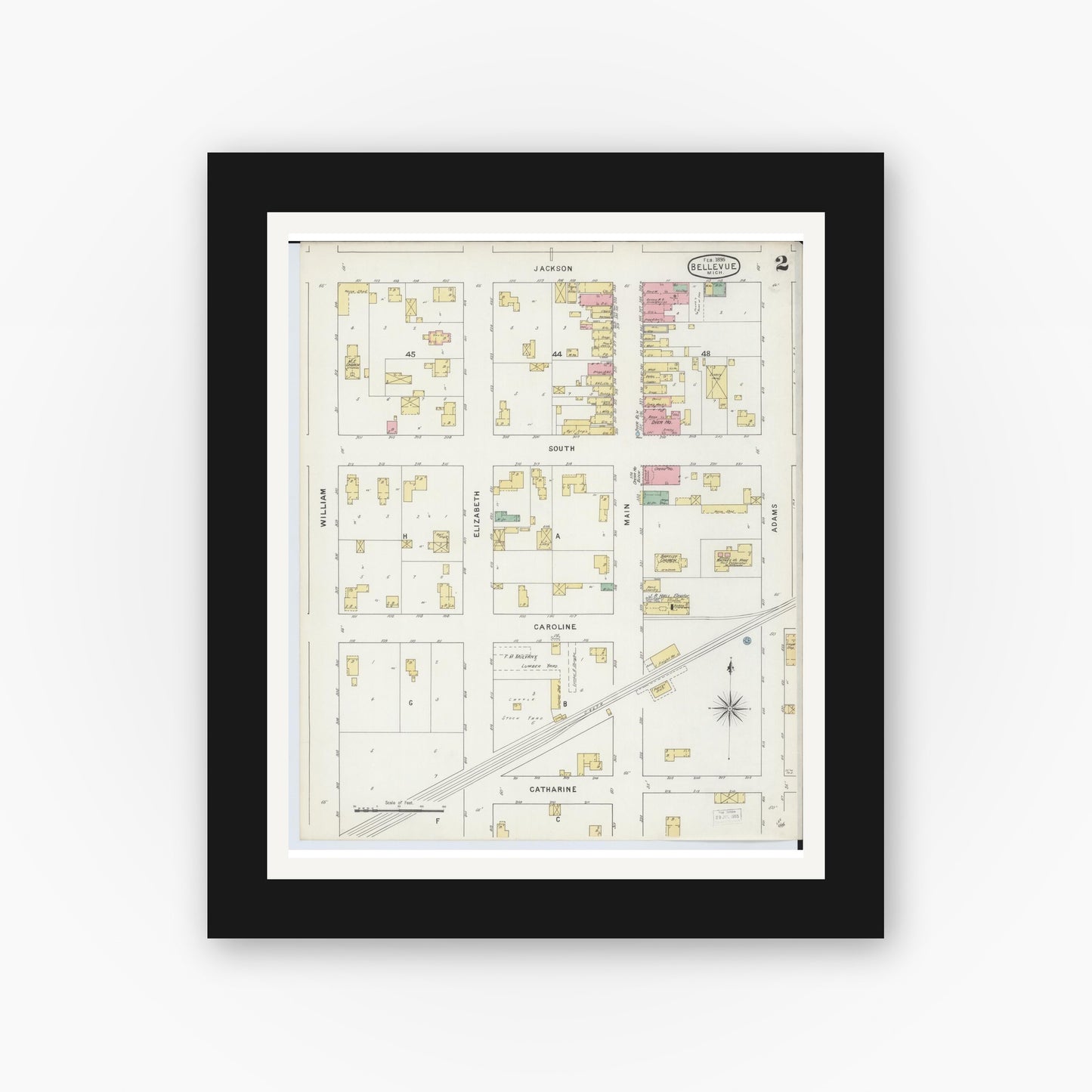 Old map wall art mockup — black gallery frame with white mat — Sanborn Fire Insurance Map from Bellevue, Eaton County, Michigan (1895), Sheet #0002