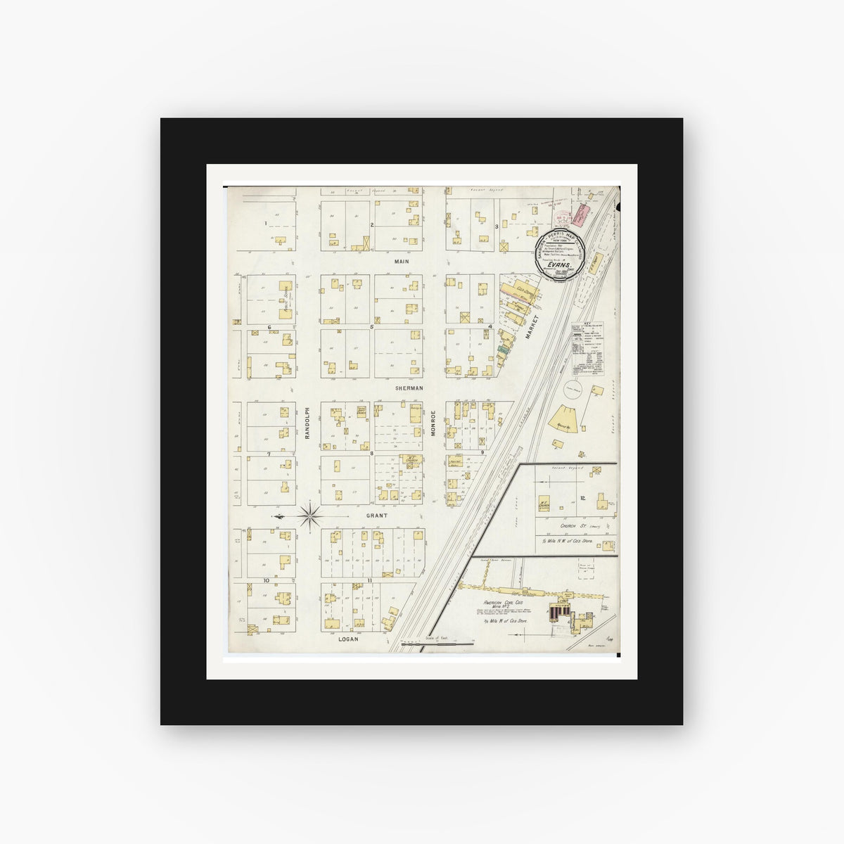 Old map wall art mockup — black gallery frame with white mat — Sanborn Fire Insurance Map from Evans, Mahaska County, Iowa (1895), Sheet #0001