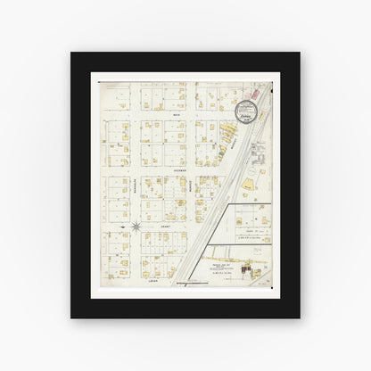 Old map wall art mockup — black gallery frame with white mat — Sanborn Fire Insurance Map from Evans, Mahaska County, Iowa (1895), Sheet #0001