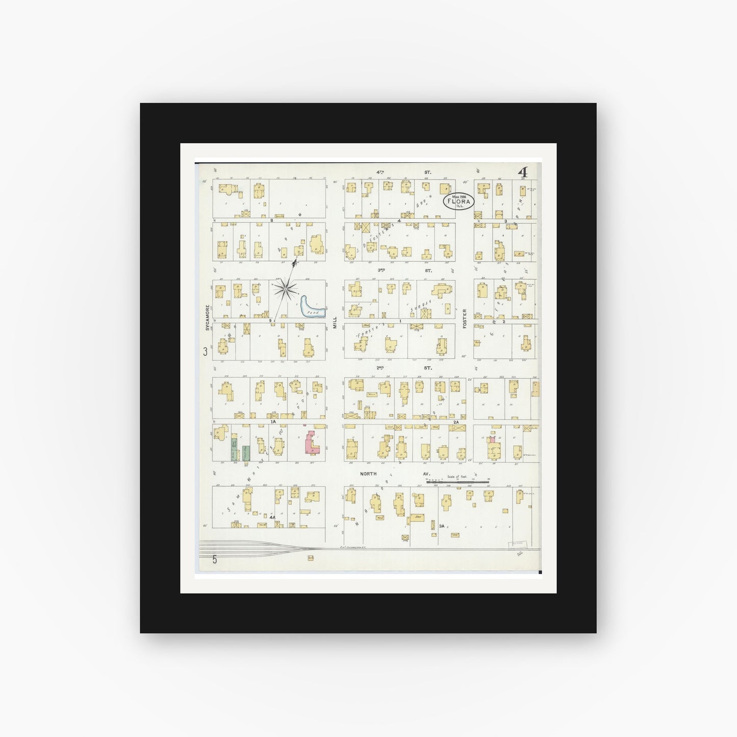 Old map wall art mockup — black gallery frame with white mat — Sanborn Fire Insurance Map from Flora, Clay County, Illinois (1906), Sheet #0004