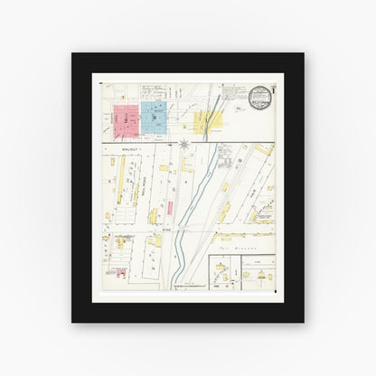 Old map wall art mockup — black gallery frame with white mat — Sanborn Fire Insurance Map from West Union, Fayette County, Iowa (1894), Sheet #0001