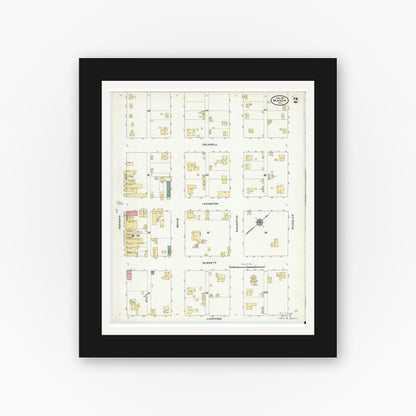 Old map wall art mockup — black gallery frame with white mat — Sanborn Fire Insurance Map from Manor, Travis County, Texas (1910), Sheet #0002