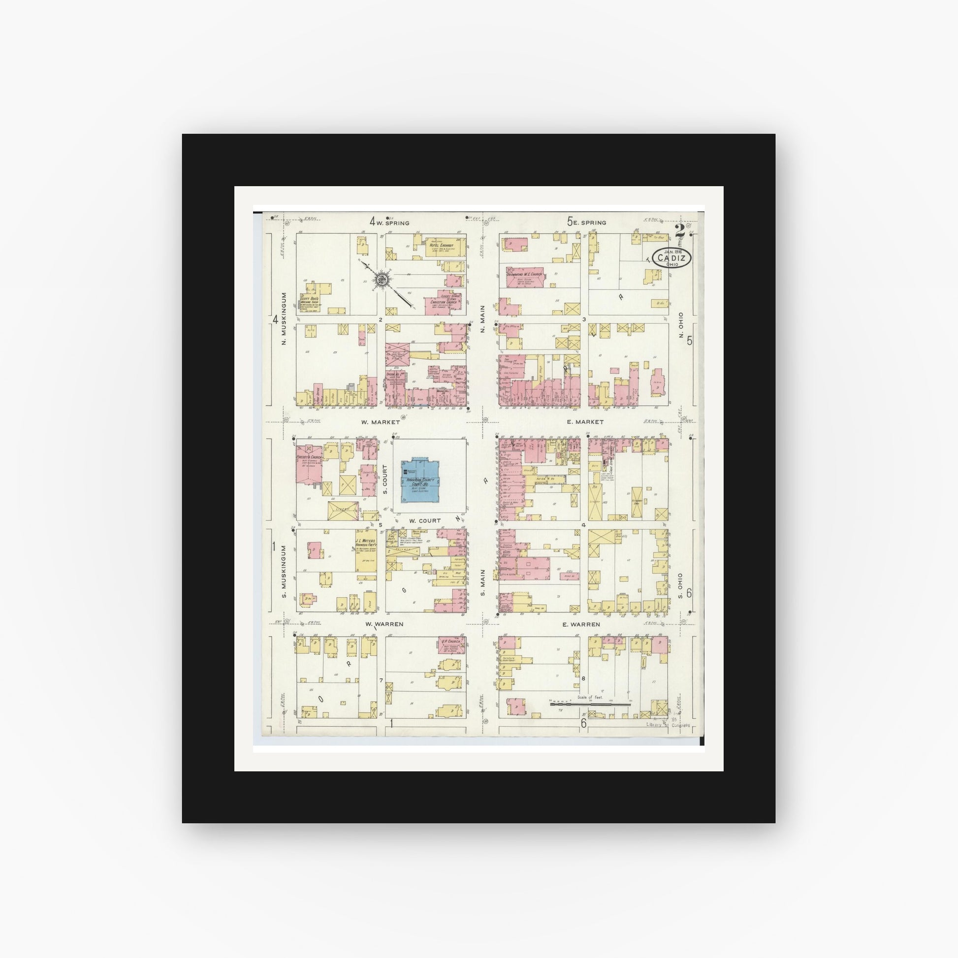 Old map wall art mockup — black gallery frame with white mat — Sanborn Fire Insurance Map from Cadiz, Harrison County, Ohio (1916), Sheet #0002
