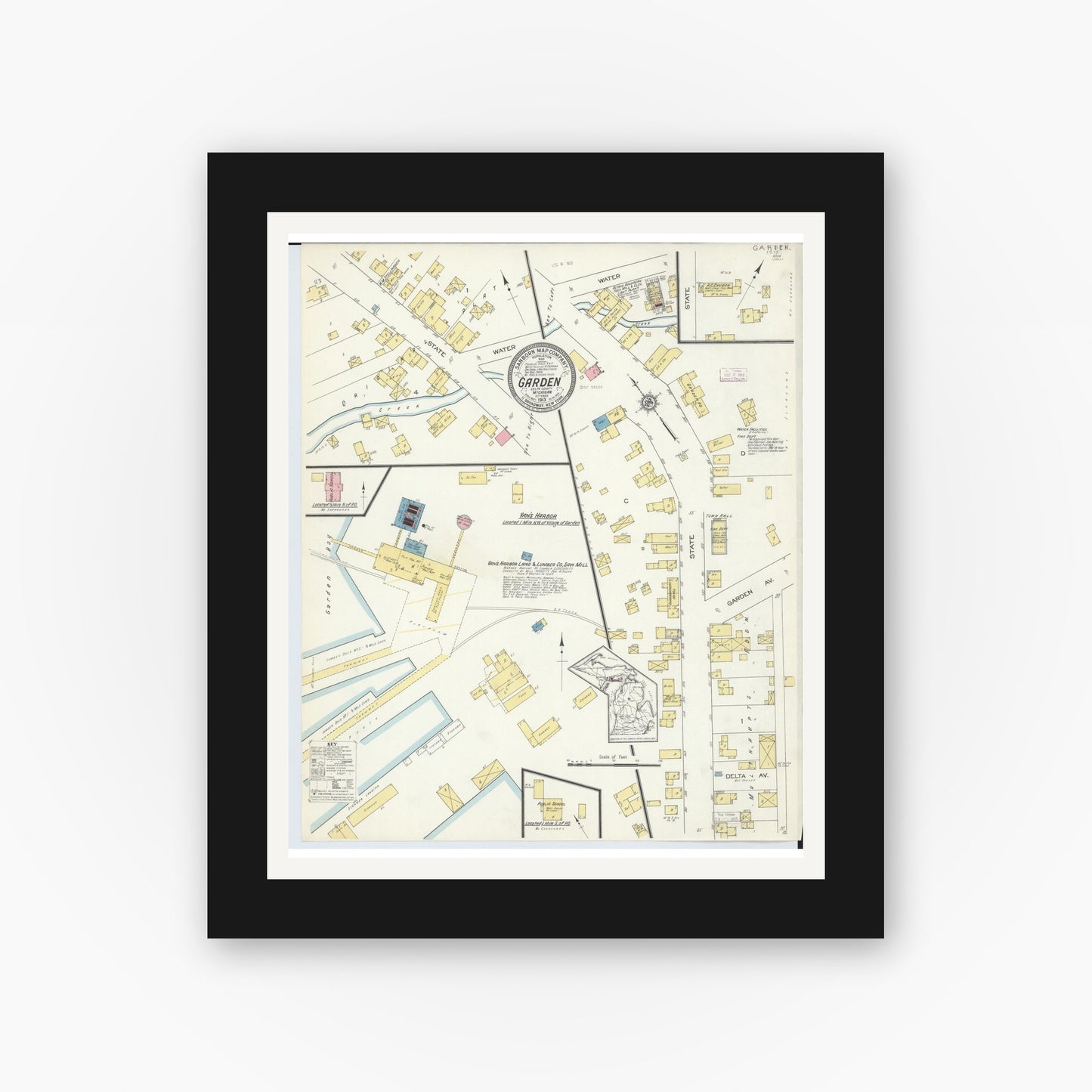 Old map wall art mockup — black gallery frame with white mat — Sanborn Fire Insurance Map from Garden, Delta County, Michigan (1913), Sheet #0001