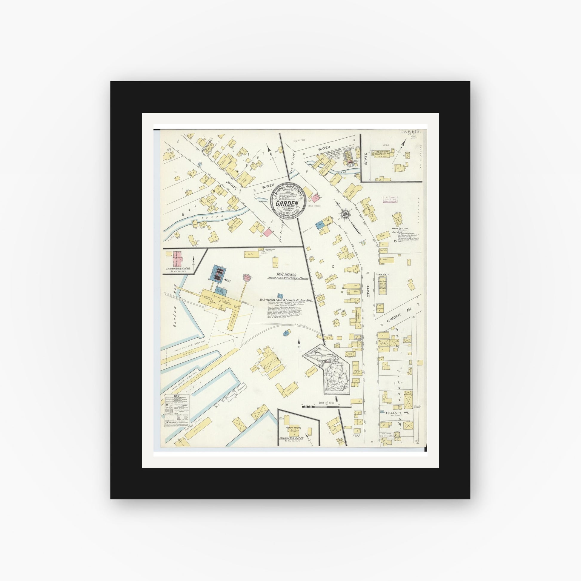 Old map wall art mockup — black gallery frame with white mat — Sanborn Fire Insurance Map from Garden, Delta County, Michigan (1913), Sheet #0001