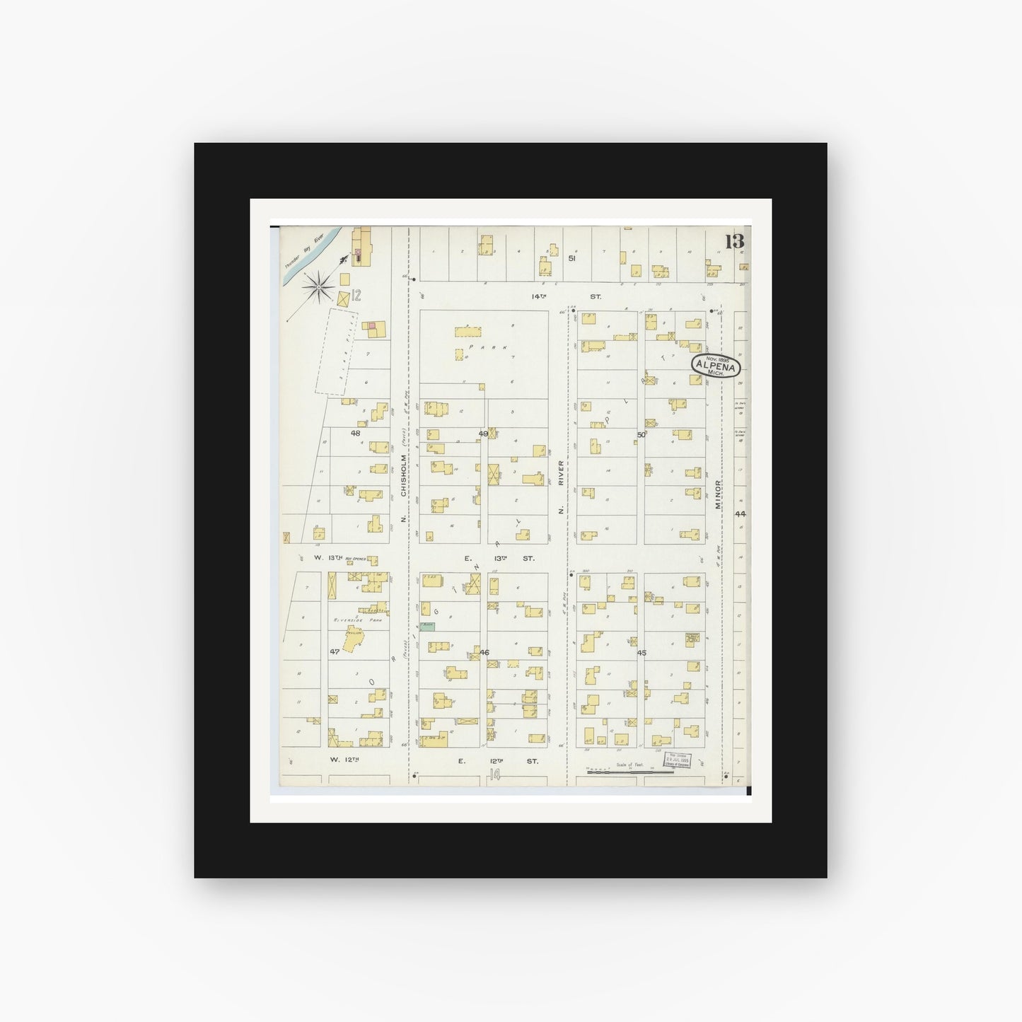 Old map wall art mockup — black gallery frame with white mat — Sanborn Fire Insurance Map from Alpena, Alpena County, Michigan (1895), Sheet #0013