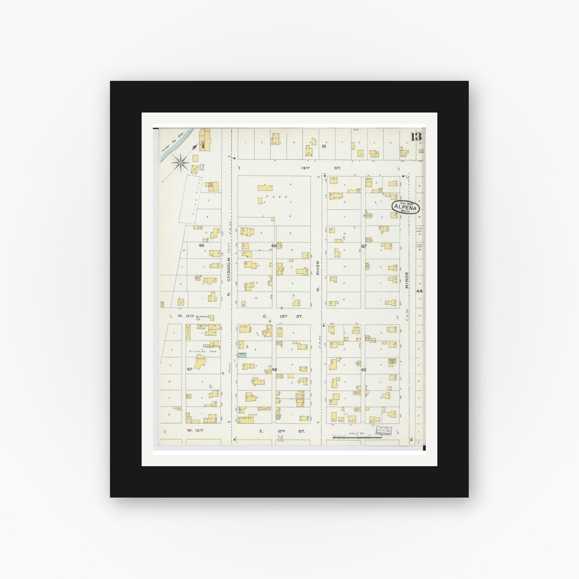 Old map wall art mockup — black gallery frame with white mat — Sanborn Fire Insurance Map from Alpena, Alpena County, Michigan (1895), Sheet #0013