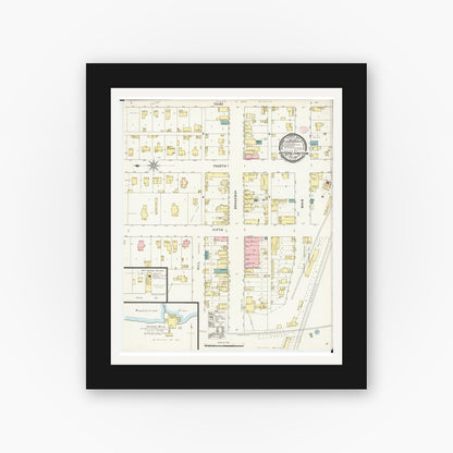 Old map wall art mockup — black gallery frame with white mat — Sanborn Fire Insurance Map from Oxford Junction, Jones County, Iowa (1895), Sheet #0001