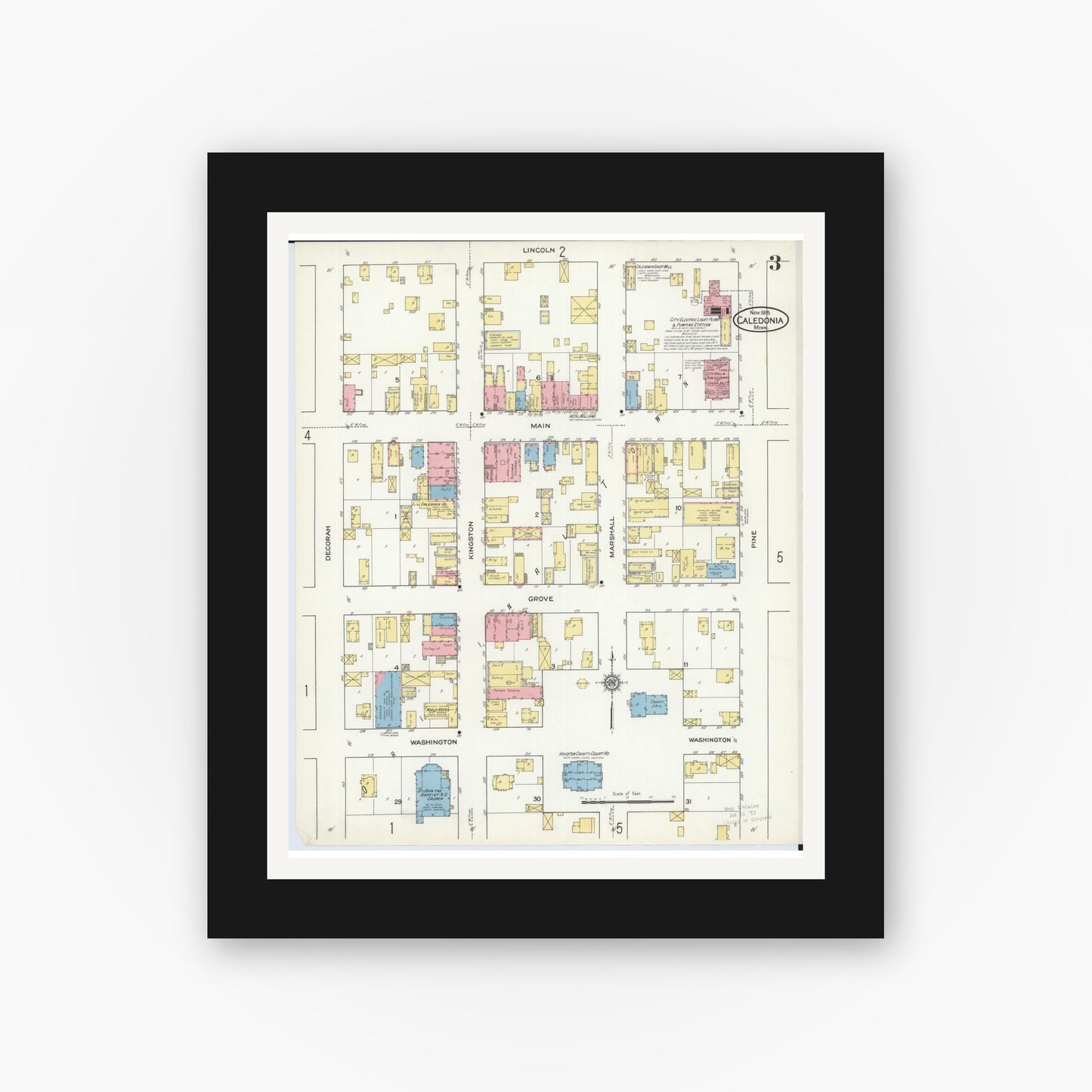 Old map wall art mockup — black gallery frame with white mat — Sanborn Fire Insurance Map from Caledonia, Houston County, Minnesota (1915), Sheet #0003