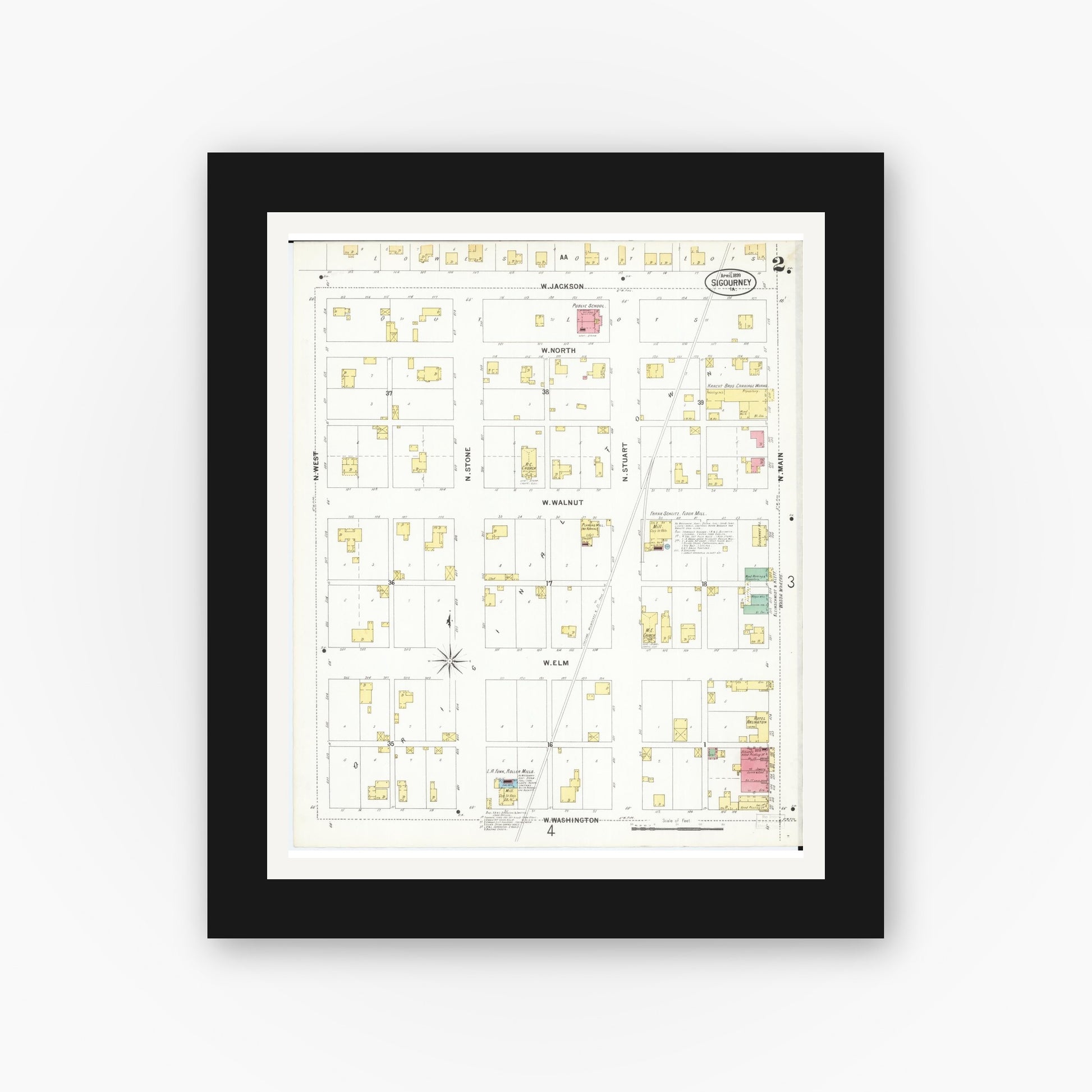Old map wall art mockup — black gallery frame with white mat — Sanborn Fire Insurance Map from Sigourney, Kiokuk County, Iowa (1899), Sheet #0002