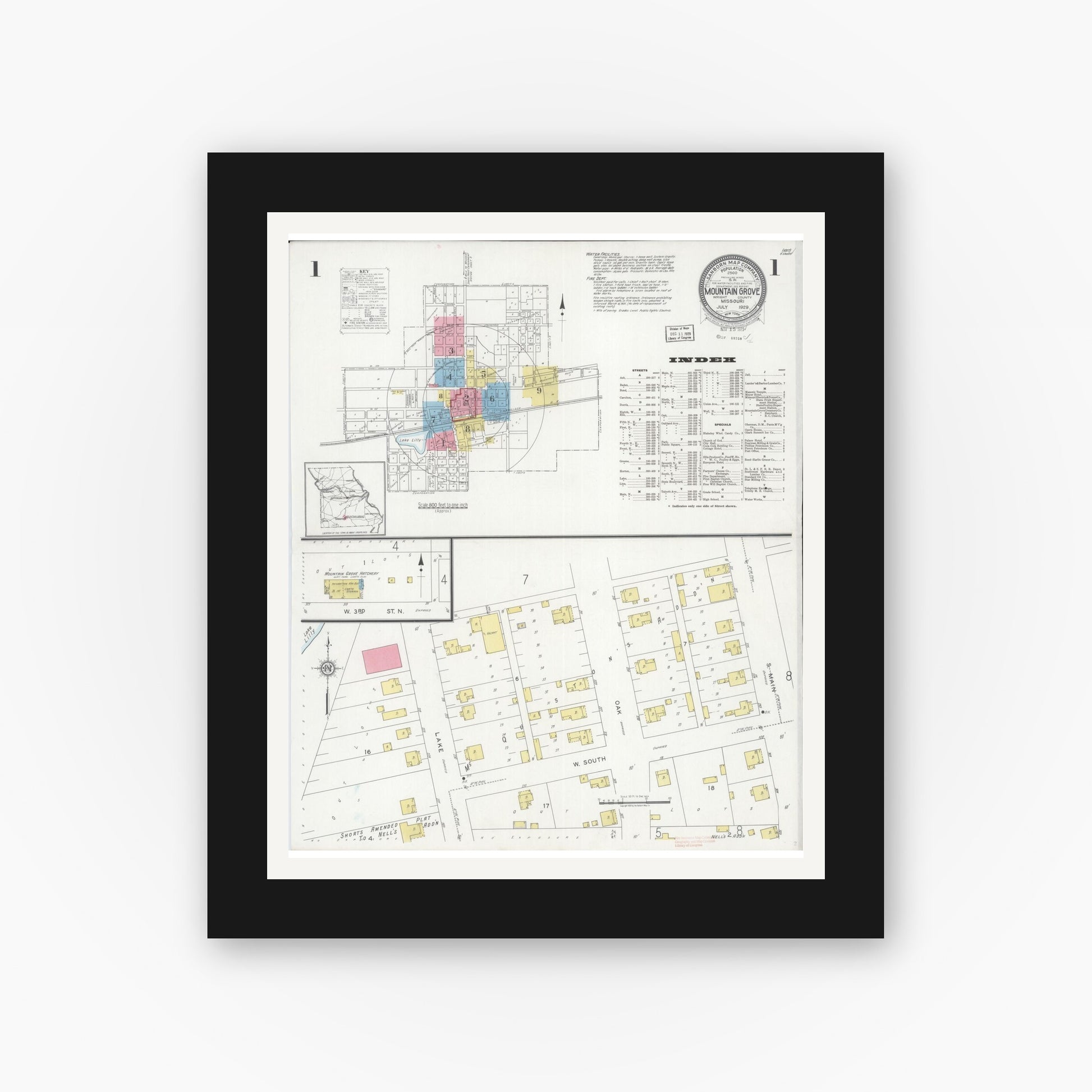 Old map wall art mockup — black gallery frame with white mat — Sanborn Fire Insurance Map from Mountain Grove, Wright County, Missouri (1929), Sheet #0001