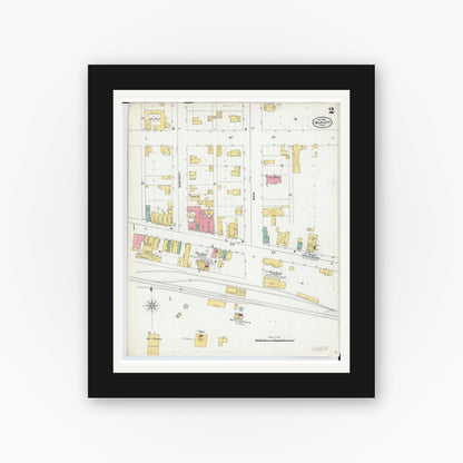 Old map wall art mockup — black gallery frame with white mat — Sanborn Fire Insurance Map from Imlay City, Lapeer County, Michigan (1900), Sheet #0002