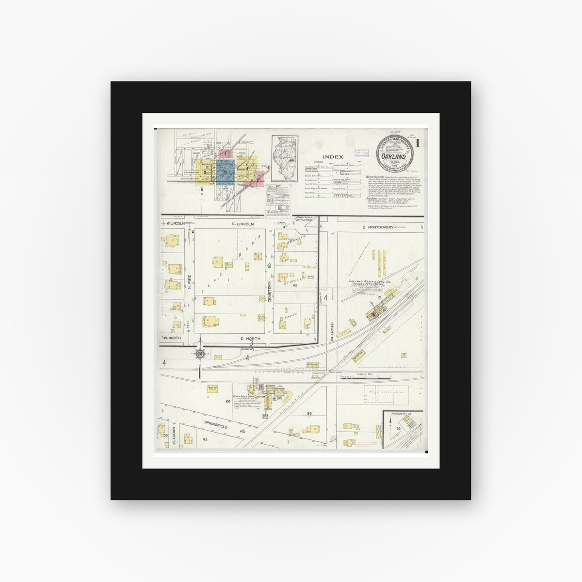 Old map wall art mockup — black gallery frame with white mat — Sanborn Fire Insurance Map from Oakland, Coles County, Illinois (1916), Sheet #0001