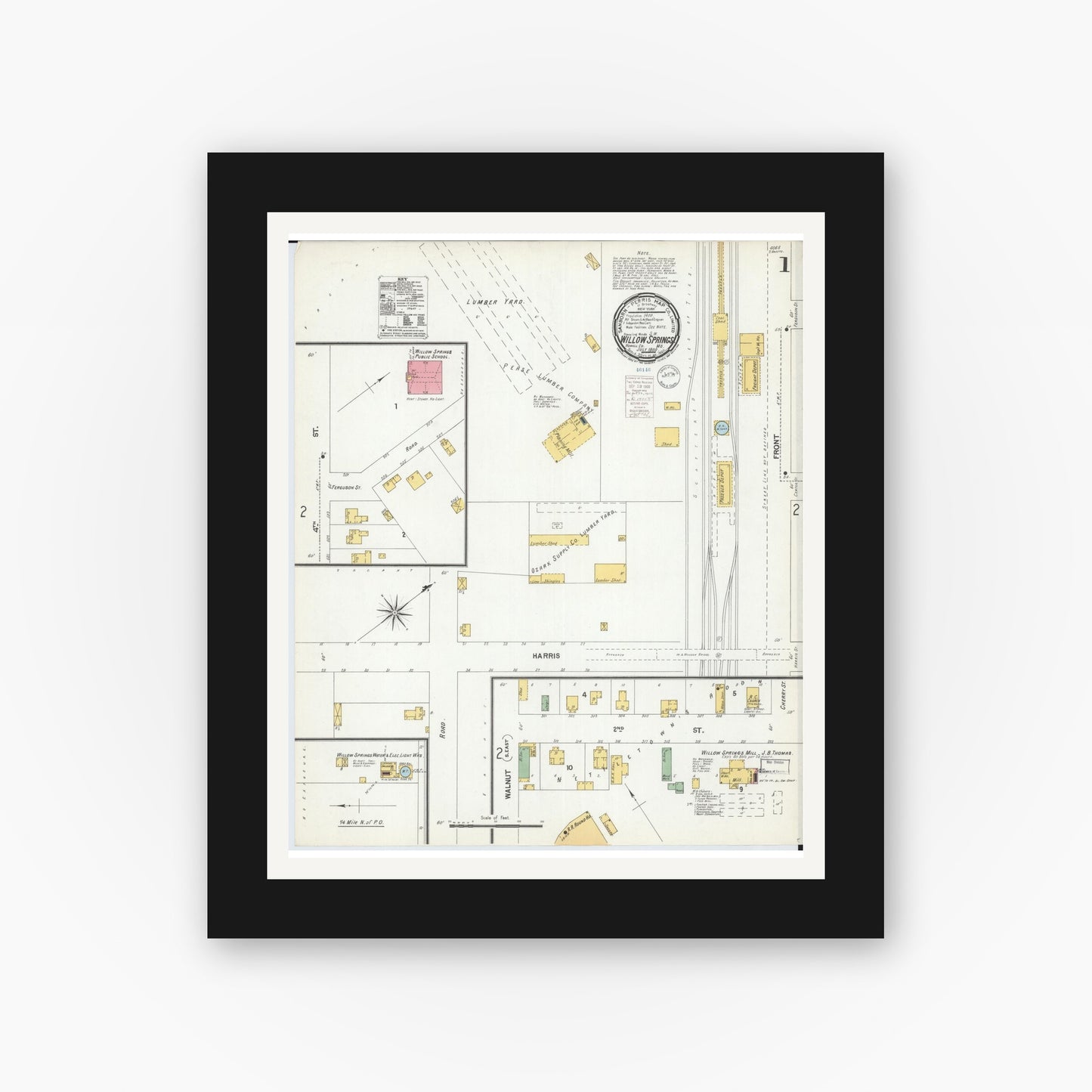 Old map wall art mockup — black gallery frame with white mat — Sanborn Fire Insurance Map from Willow Springs, Howell County, Missouri (1900), Sheet #0001