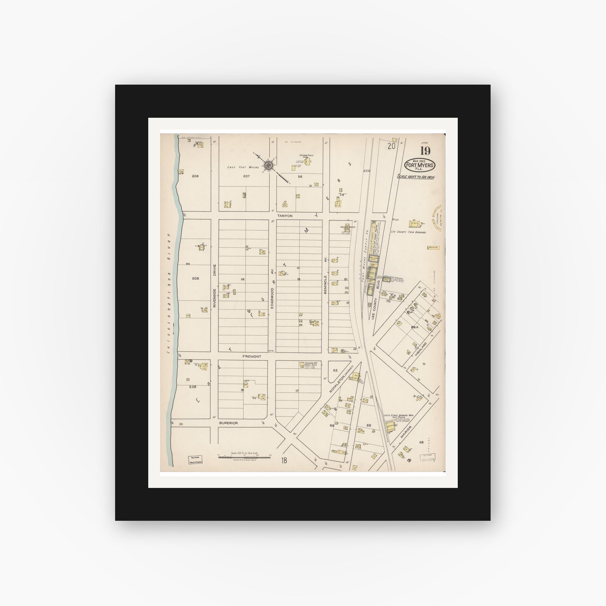 Old map wall art mockup — black gallery frame with white mat — Sanborn Fire Insurance Map from Fort Myers, Lee County, Florida (1922), Sheet #0019