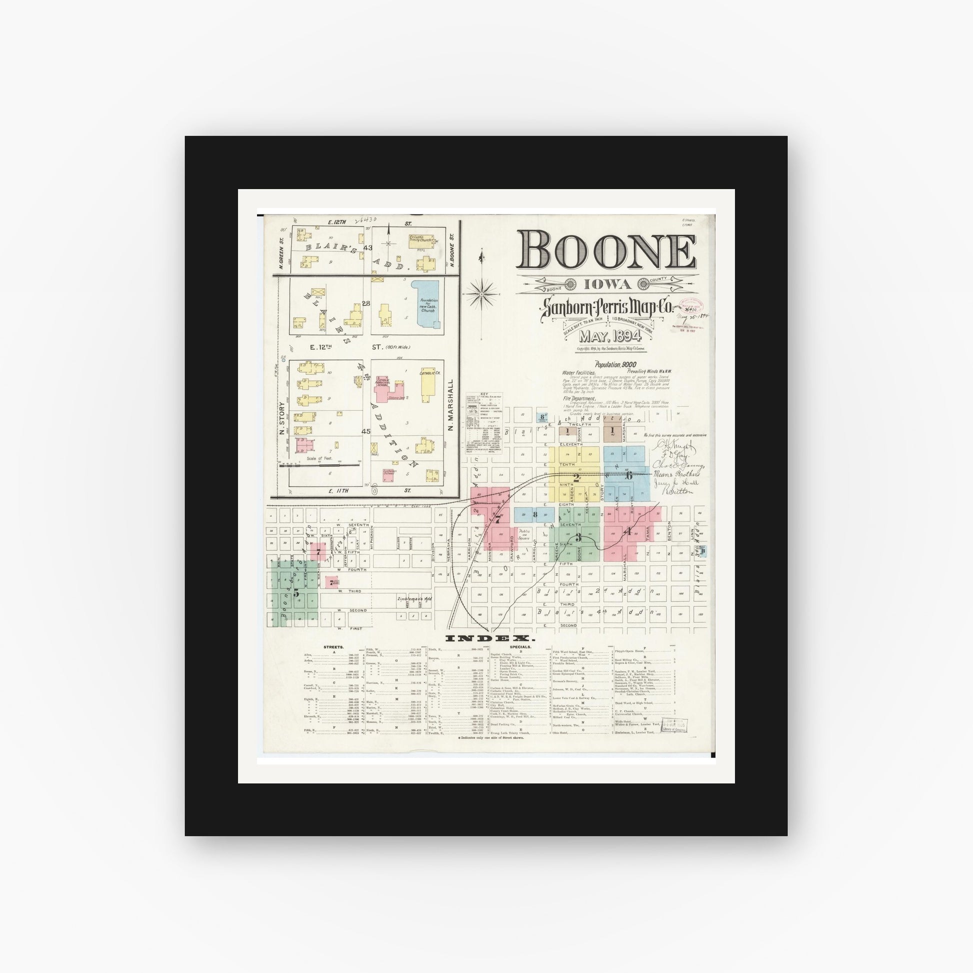 Old map wall art mockup — black gallery frame with white mat — Sanborn Fire Insurance Map from Boone, Boone County, Iowa (1894) â€” Complete Set