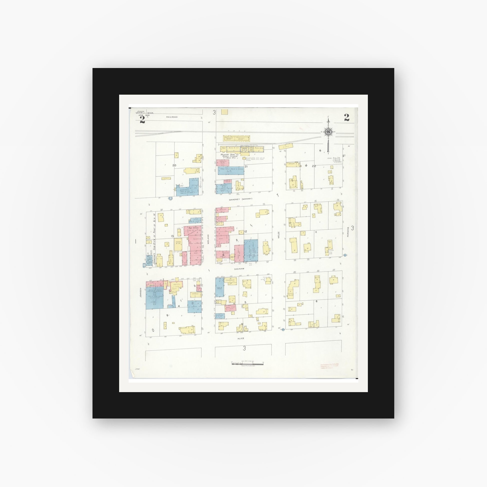 Old map wall art mockup — black gallery frame with white mat — Sanborn Fire Insurance Map from Merrill, Saginaw County, Michigan (1939), Sheet #0002