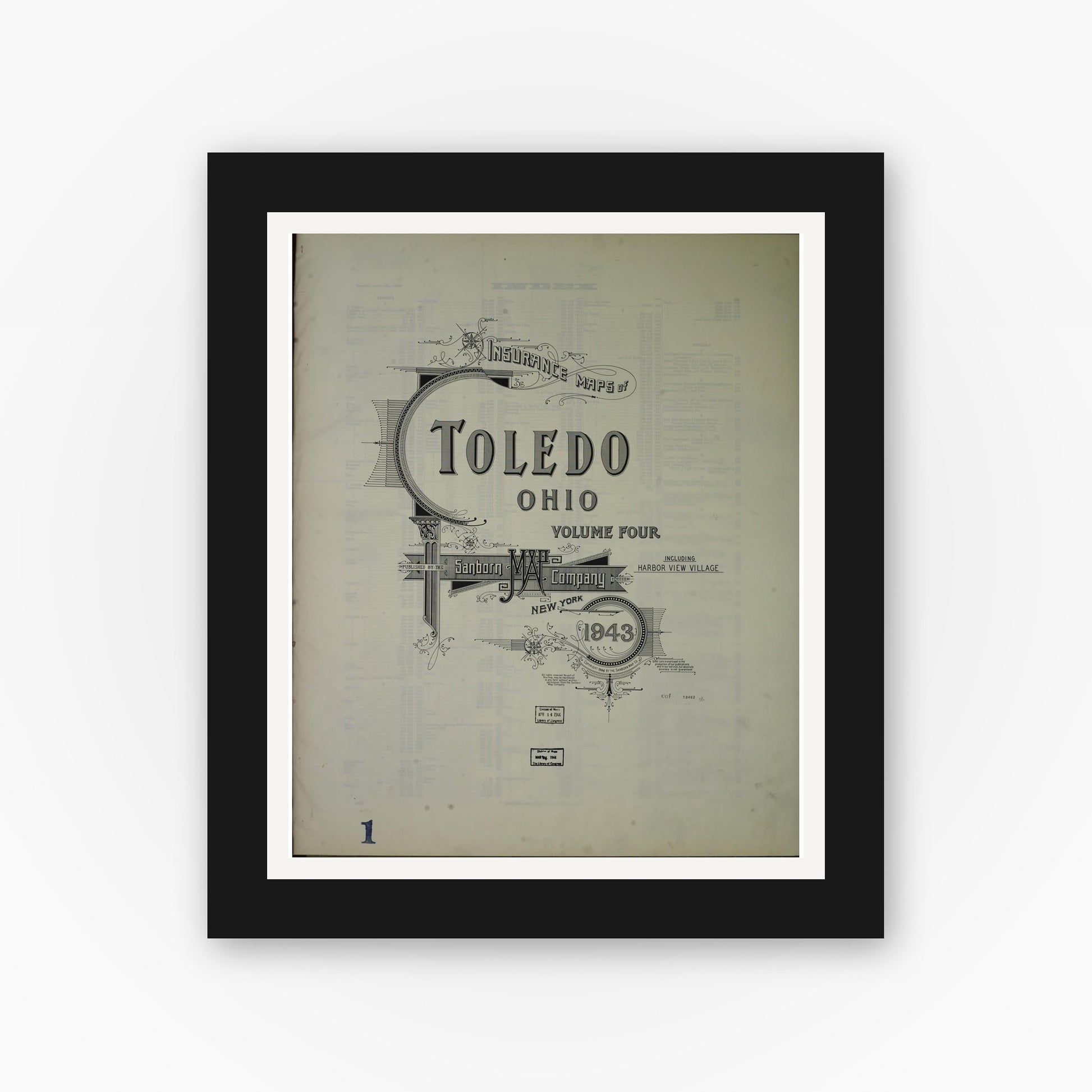 Old map wall art mockup — black gallery frame with white mat — Sanborn Fire Insurance Map from Toledo, Lucas County, Ohio (1943), Sheet #0001