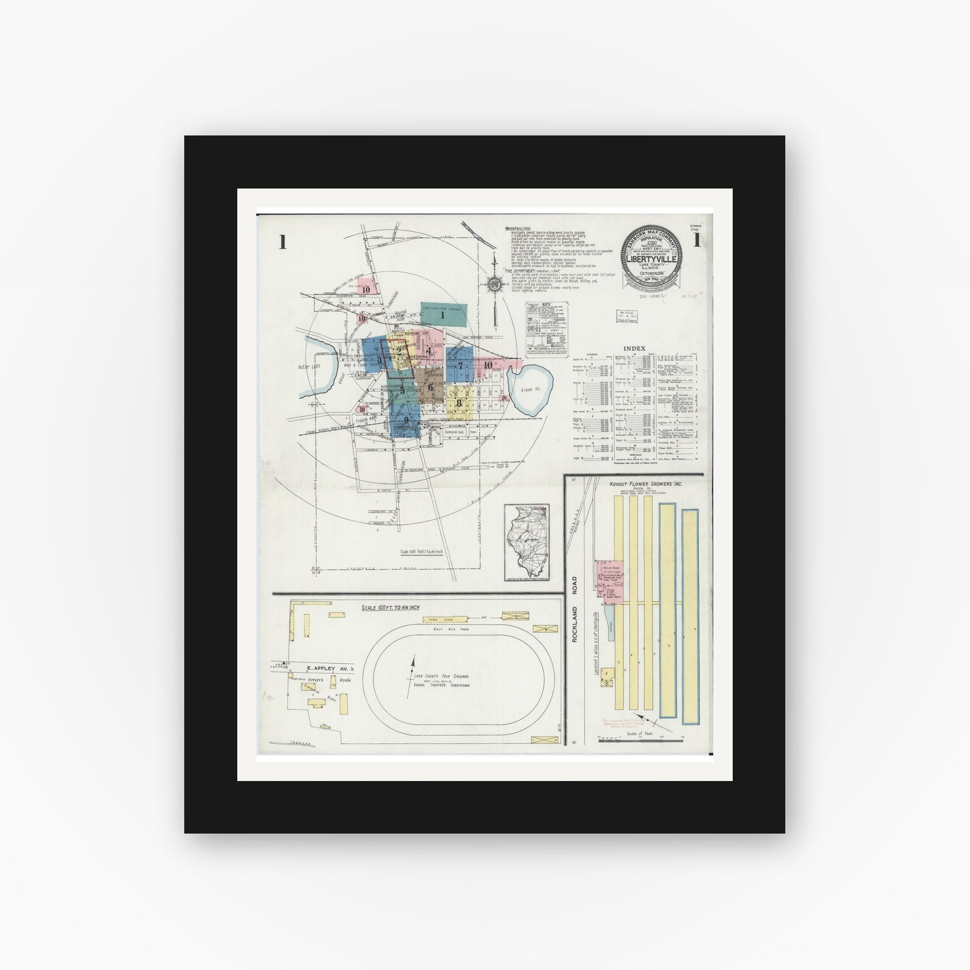Old map wall art mockup — black gallery frame with white mat — Sanborn Fire Insurance Map from Libertyville, Lake County, Illinois (1924), Sheet #0001