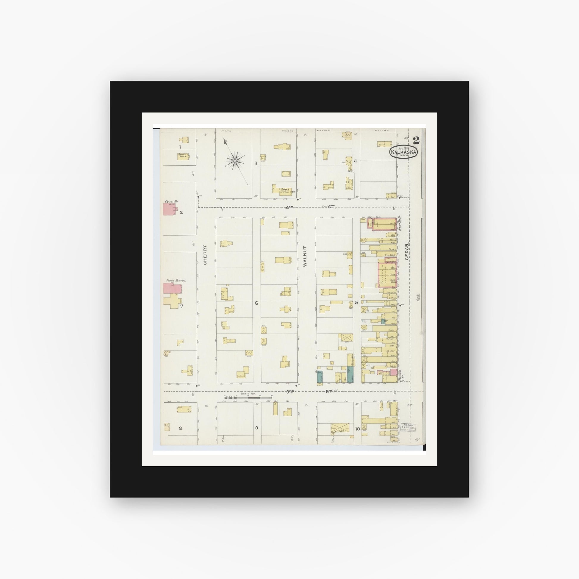 Old map wall art mockup — black gallery frame with white mat — Sanborn Fire Insurance Map from Kalkaska, Kalkaska County, Michigan (1893), Sheet #0002