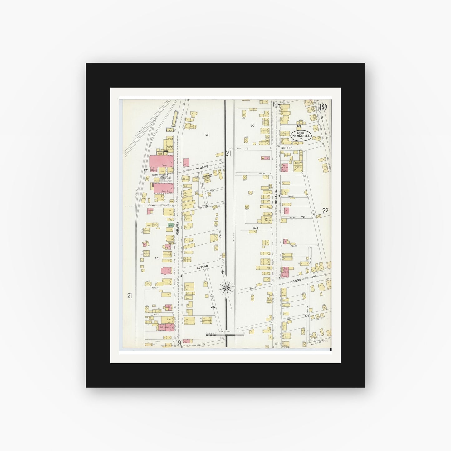 Old map wall art mockup — black gallery frame with white mat — Sanborn Fire Insurance Map from New Castle, Lawrence County, Pennsylvania (1899), Sheet #0019
