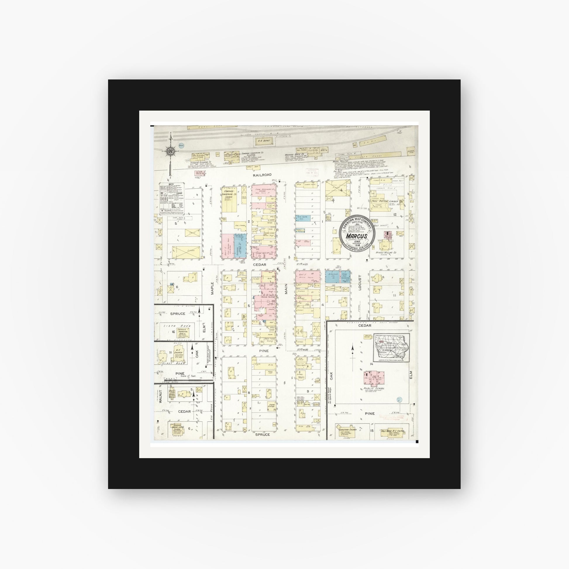 Old map wall art mockup — black gallery frame with white mat — Sanborn Fire Insurance Map from Marcus, Cherokee County, Iowa (1914), Sheet #0001