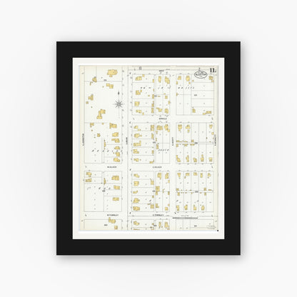 Old map wall art mockup — black gallery frame with white mat — Sanborn Fire Insurance Map from Bluffton, Wells County, Indiana (1900), Sheet #0011