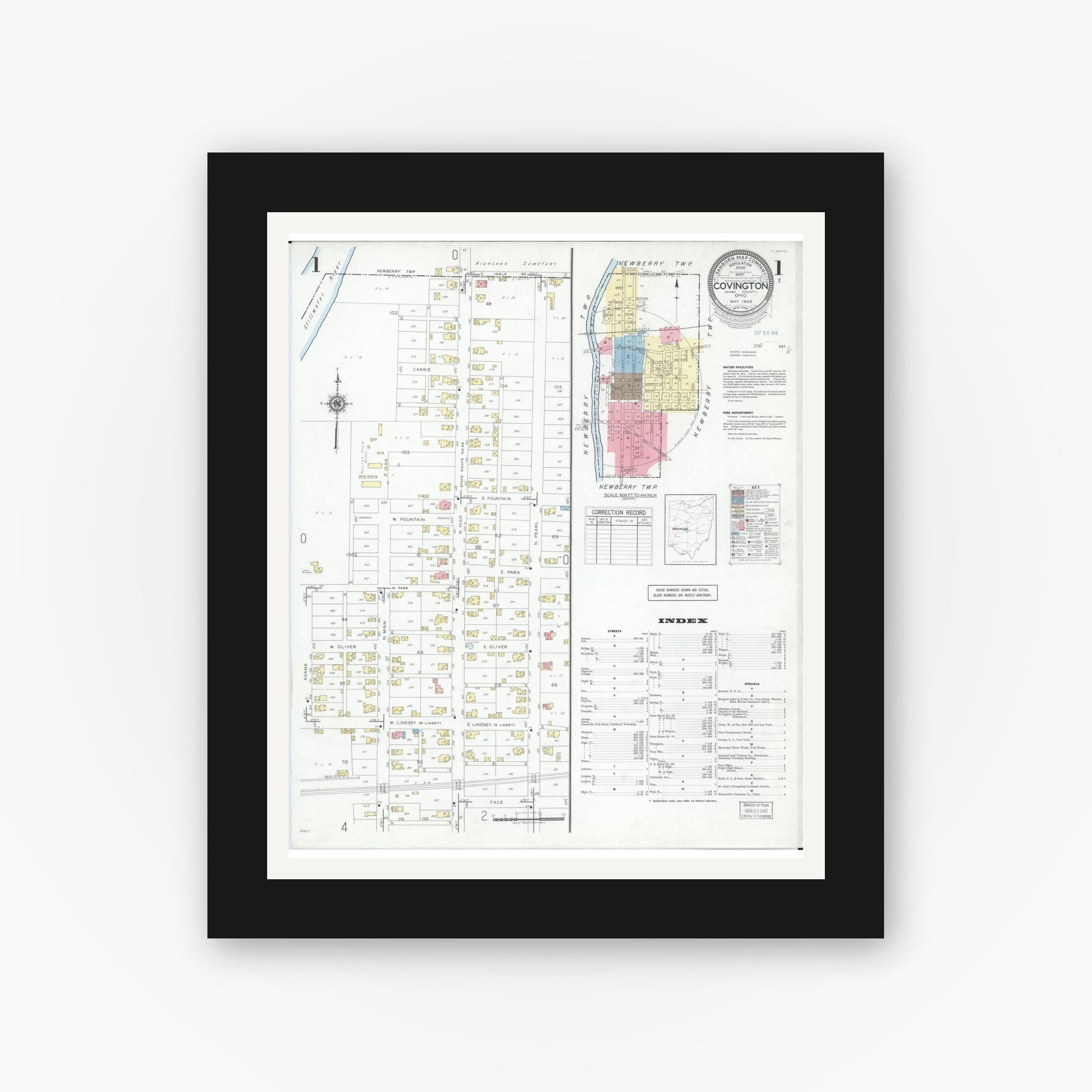 Old map wall art mockup — black gallery frame with white mat — Sanborn Fire Insurance Map from Covington, Miami County, Ohio (1946), Sheet #0001