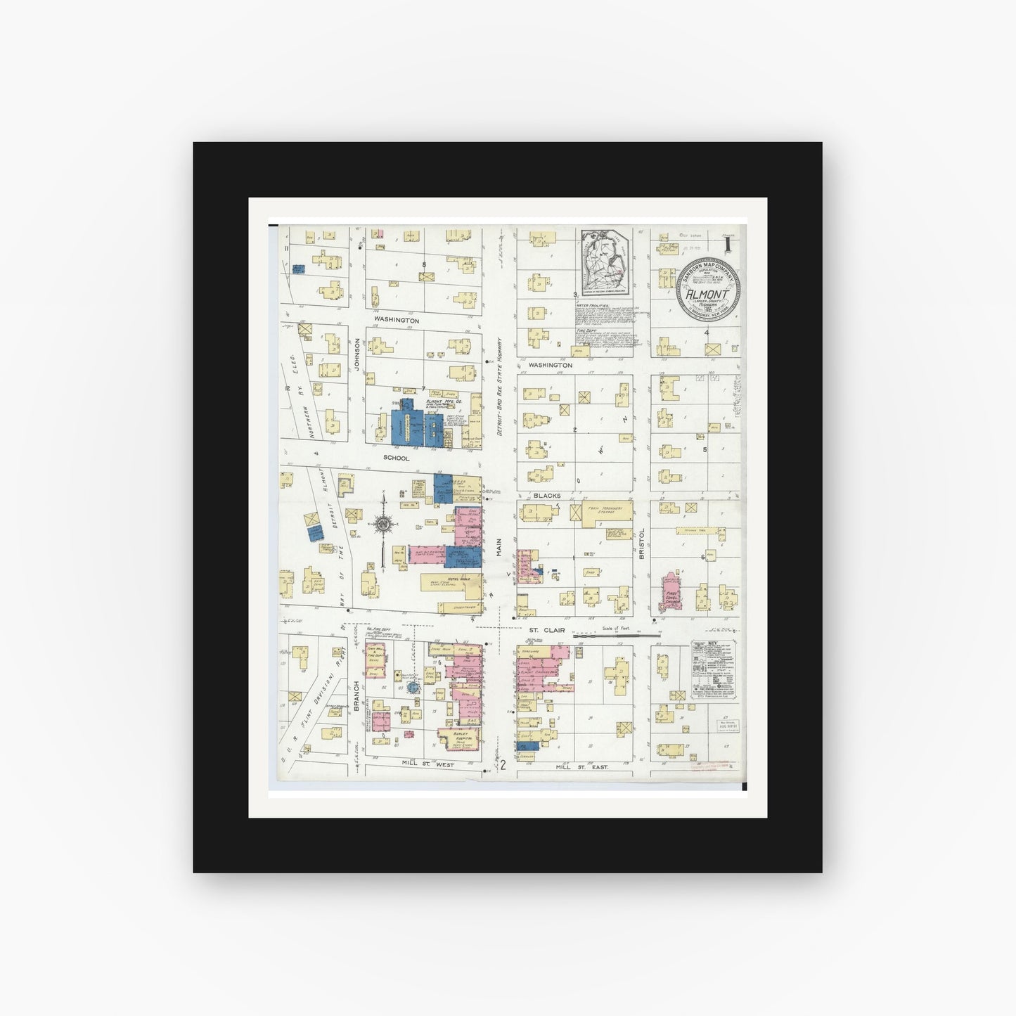 Old map wall art mockup — black gallery frame with white mat — Sanborn Fire Insurance Map from Almont, Lapeer County, Michigan (1921), Sheet #0001