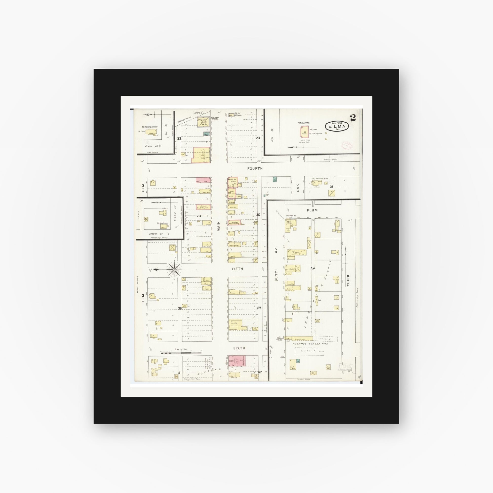 Old map wall art mockup — black gallery frame with white mat — Sanborn Fire Insurance Map from Elma, Howard County, Iowa (1894), Sheet #0002