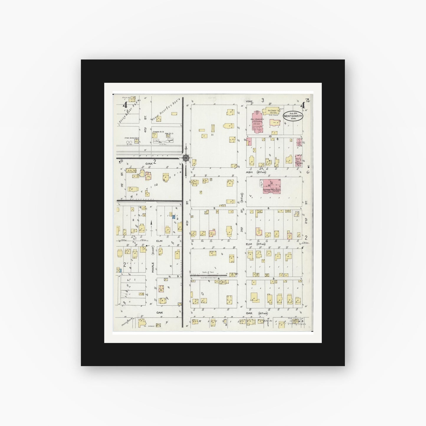 Old map wall art mockup — black gallery frame with white mat — Sanborn Fire Insurance Map from Montgomery, Le Sueur County, Minnesota (1924), Sheet #0004