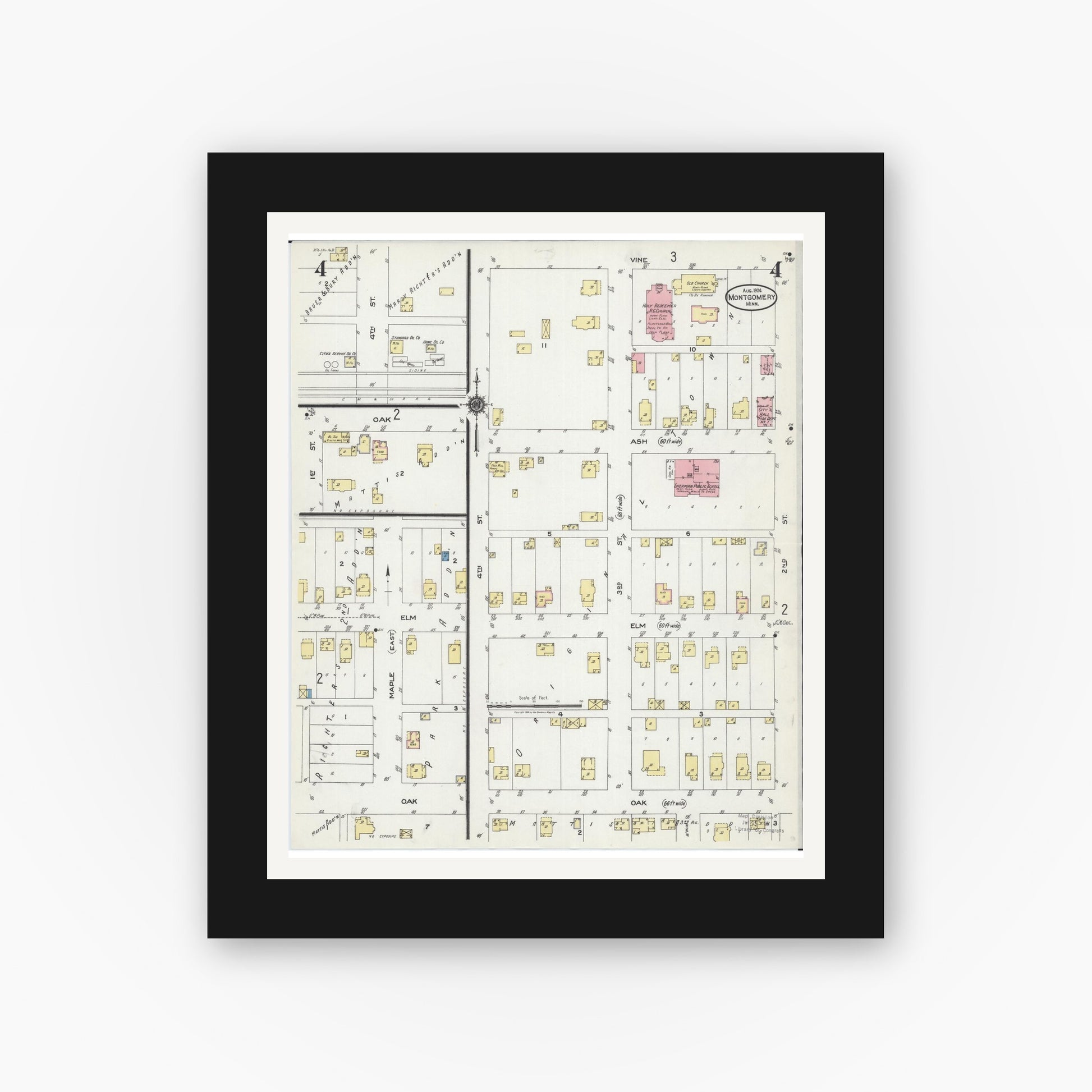 Old map wall art mockup — black gallery frame with white mat — Sanborn Fire Insurance Map from Montgomery, Le Sueur County, Minnesota (1924), Sheet #0004