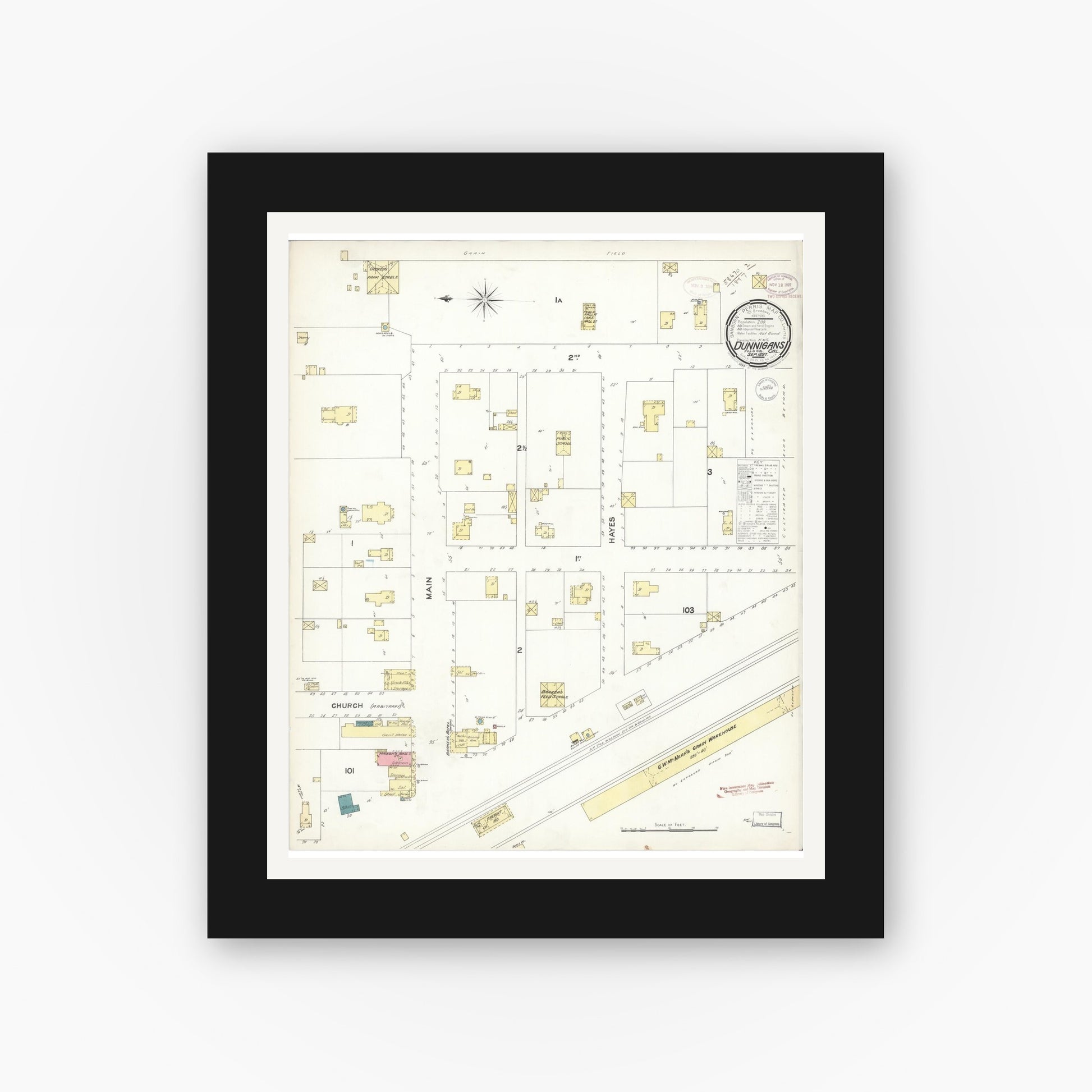 Old map wall art mockup — black gallery frame with white mat — Sanborn Fire Insurance Map from Dunnigan, Yolo County, California (1897), Sheet #0001